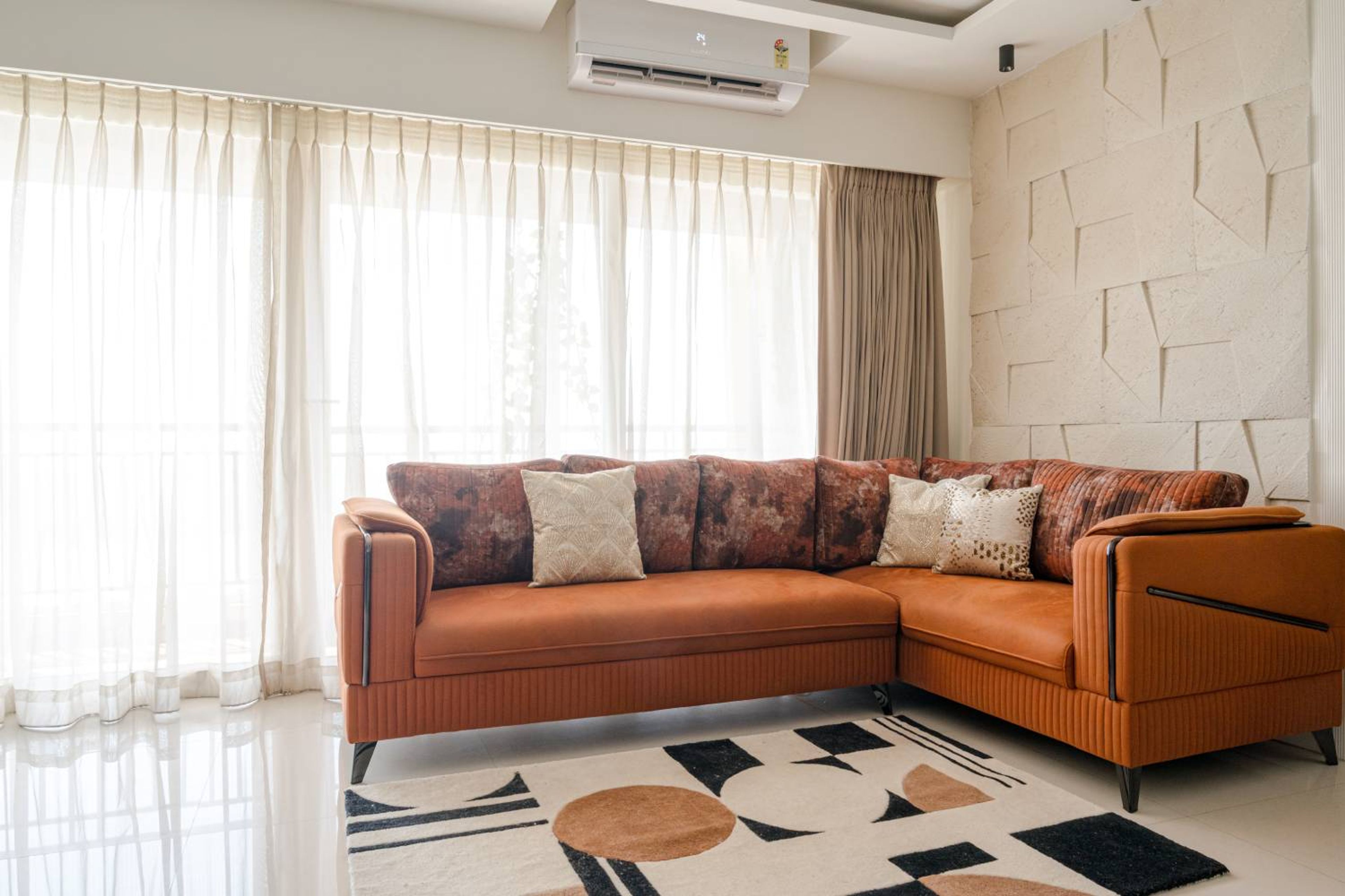 Living room Design with orange L-shaped sofa