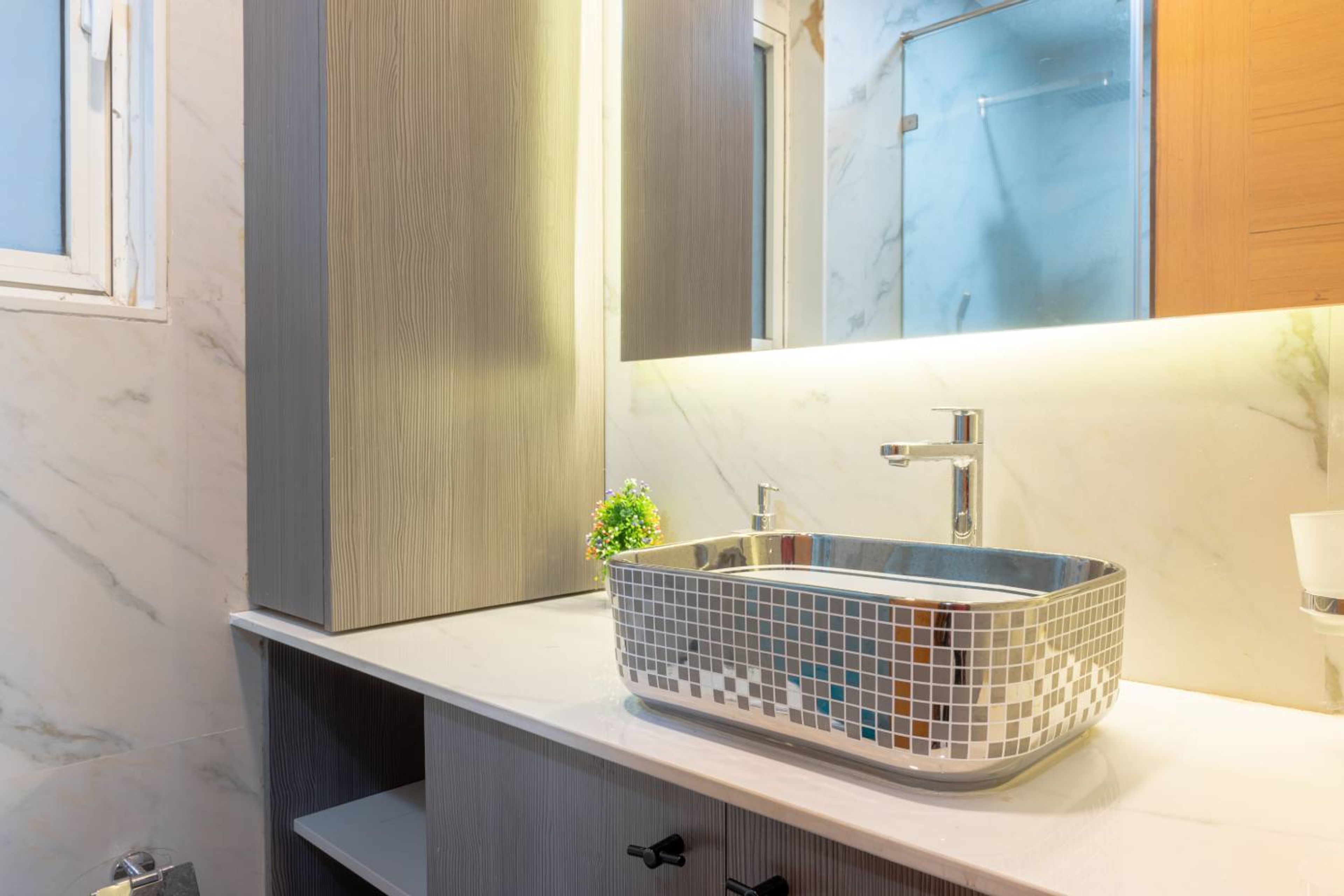 Bathroom Design with Rectangular Mirror and Mosaic Chrome Detailing Sink