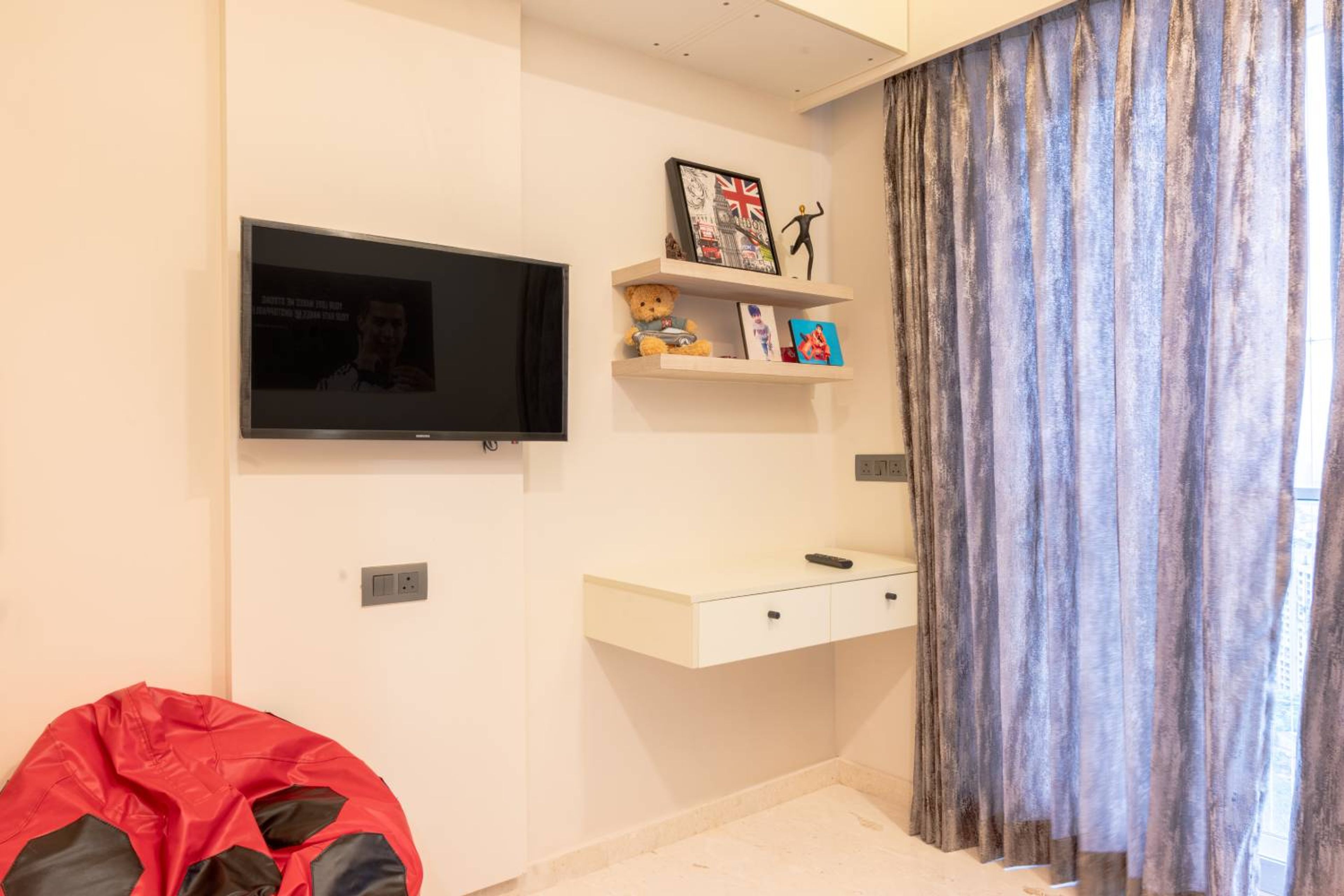 Kids Bedroom Design with Wall Mounted TV Unit and Wall Mounted Study Desk