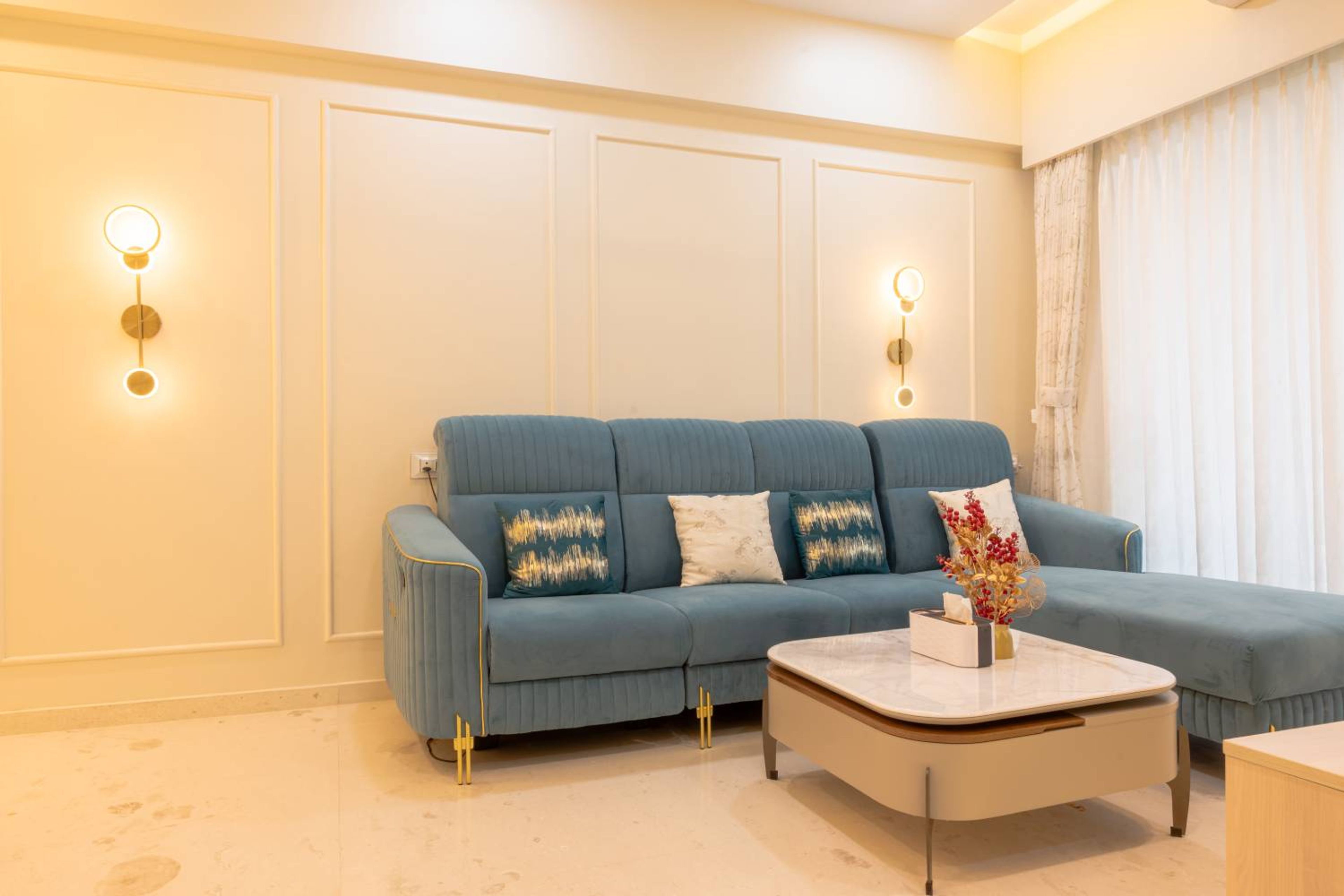 Living Room Design with Blue L-Shaped Sofa