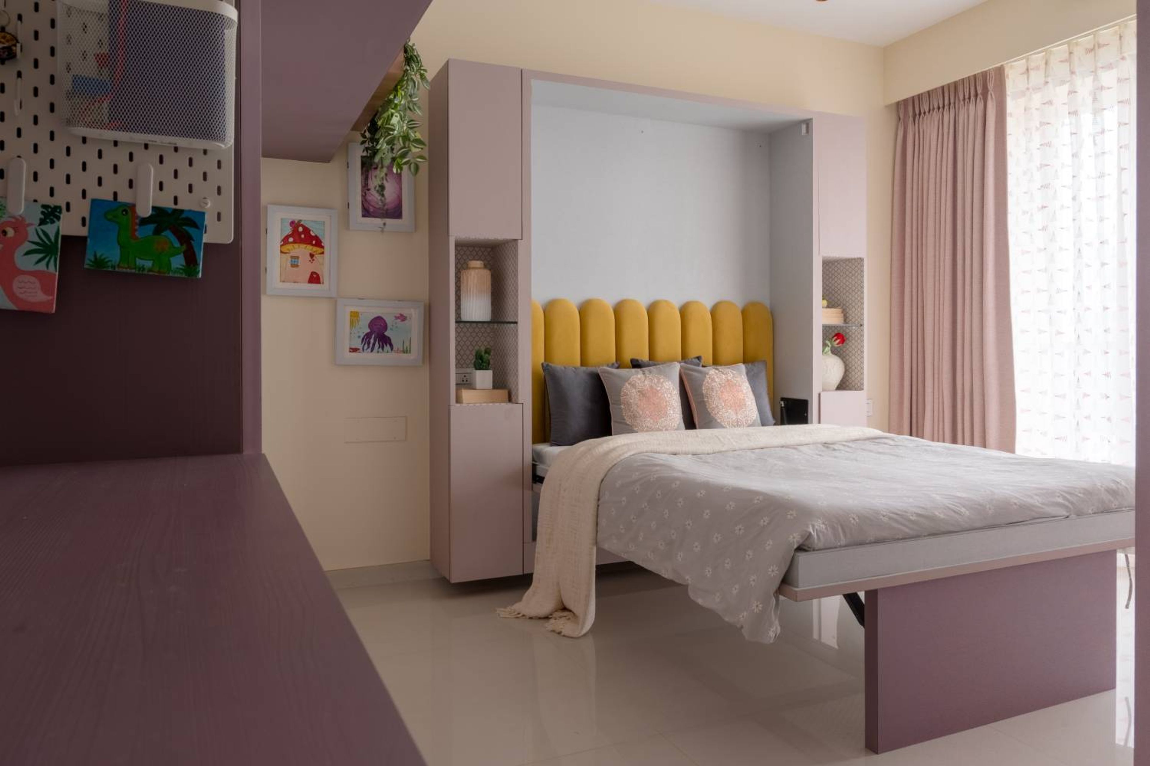Bedroom design with yellow arched cushioned headboard bed