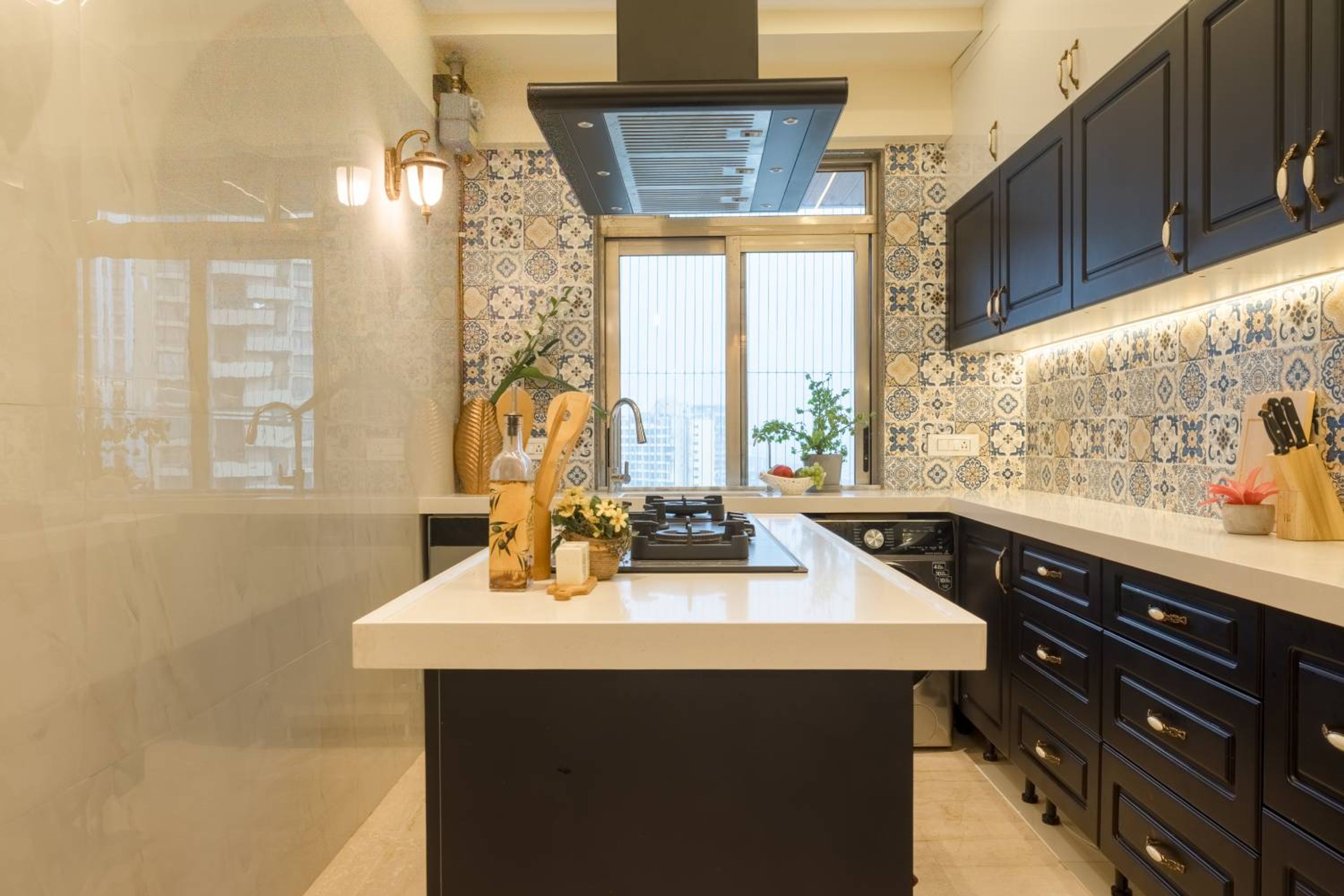 Island kitchen design with dark brown profile shutter units