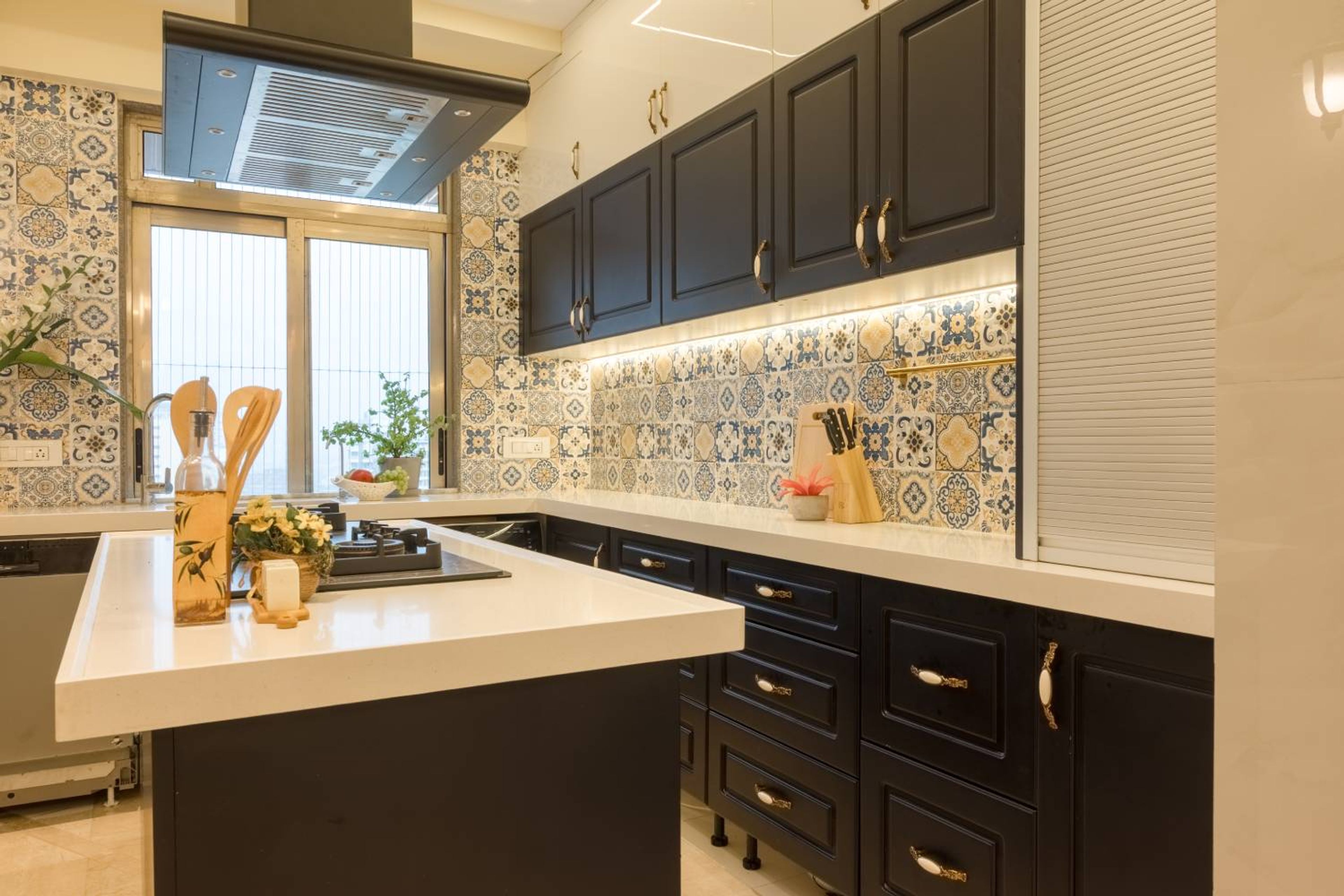 Island kitchen design with moroccan tiles backsplash