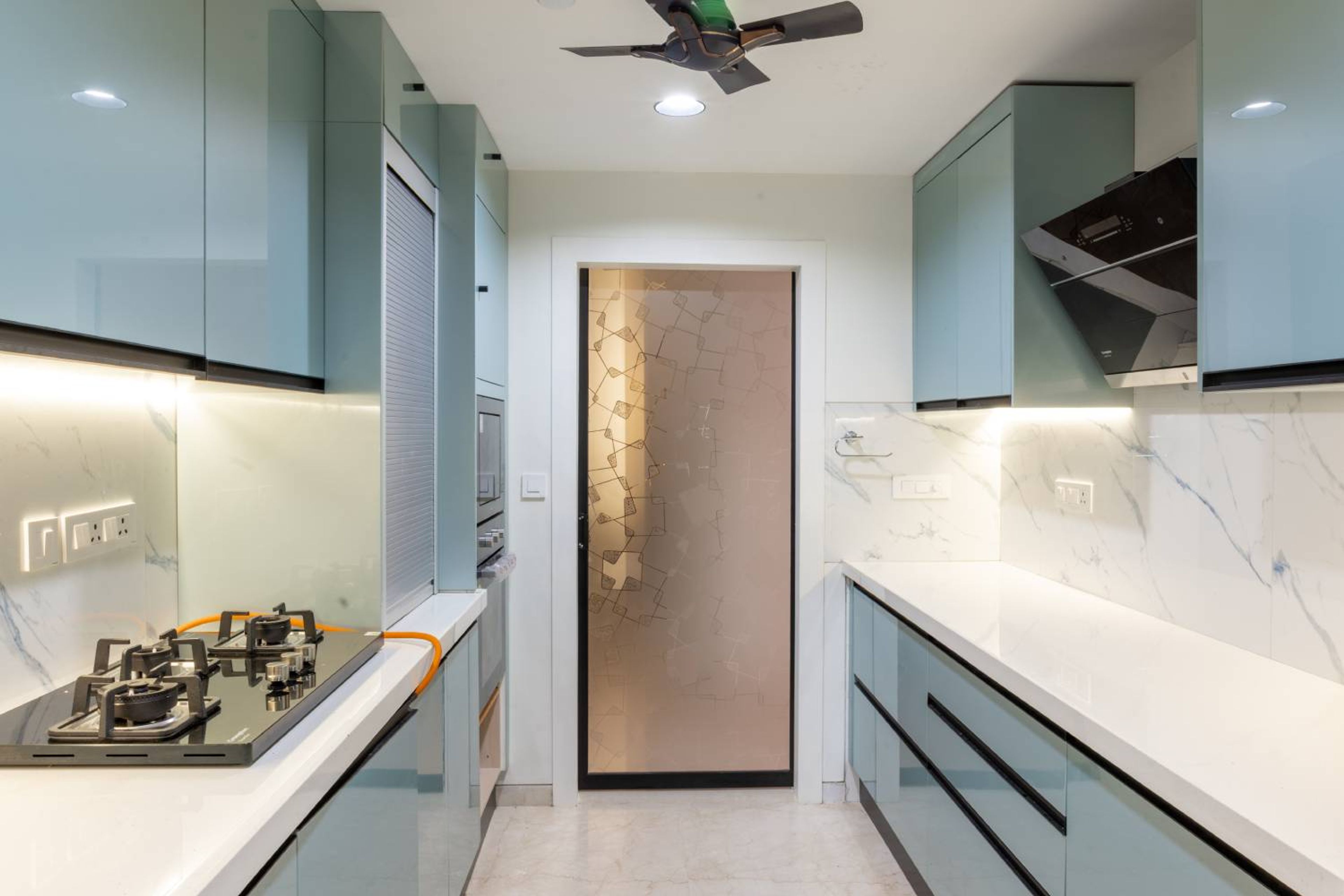 Modern Aqua Parallel Kitchen Design with Quartz Countertop