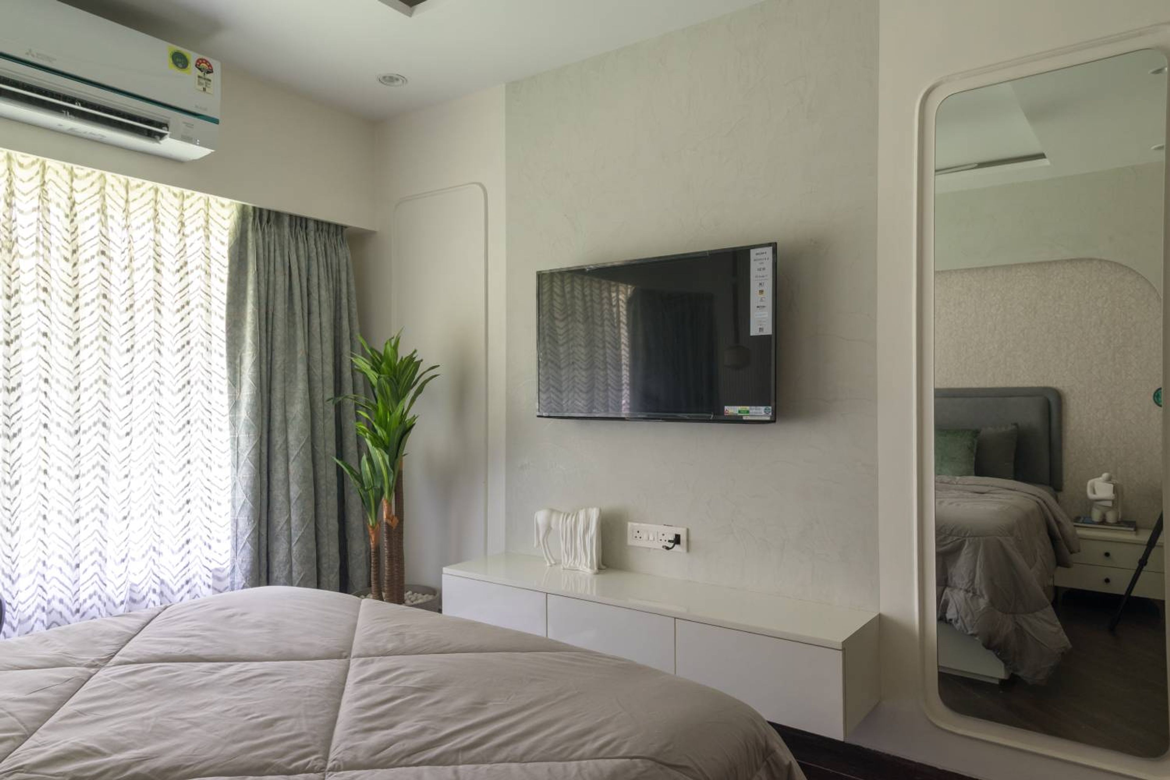 Bedroom Design with Grey TV Unit and Wall Mlunted Full Length Mirror