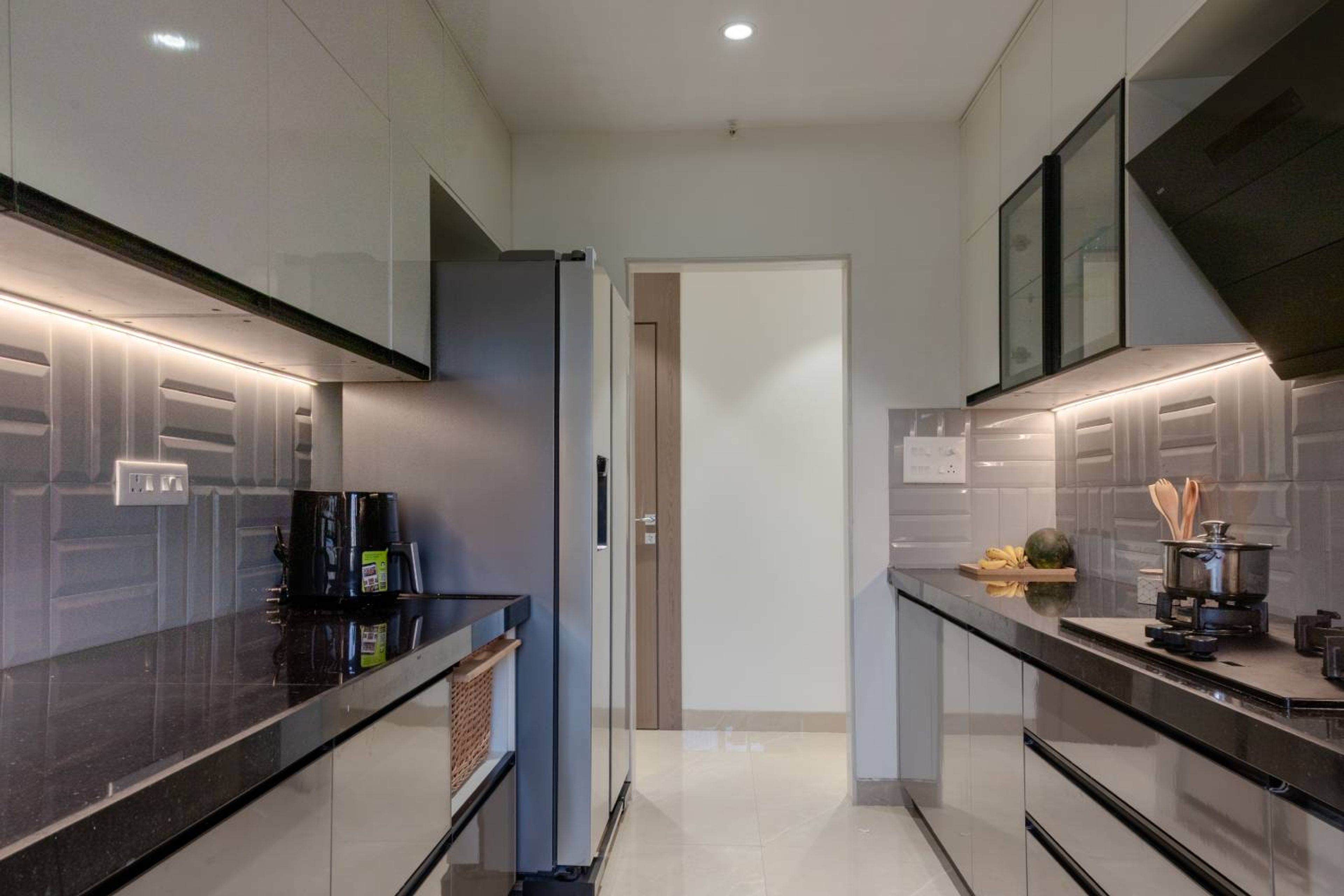 Parallel Kitchen Design with Grey-White Cabinets and Granite Top