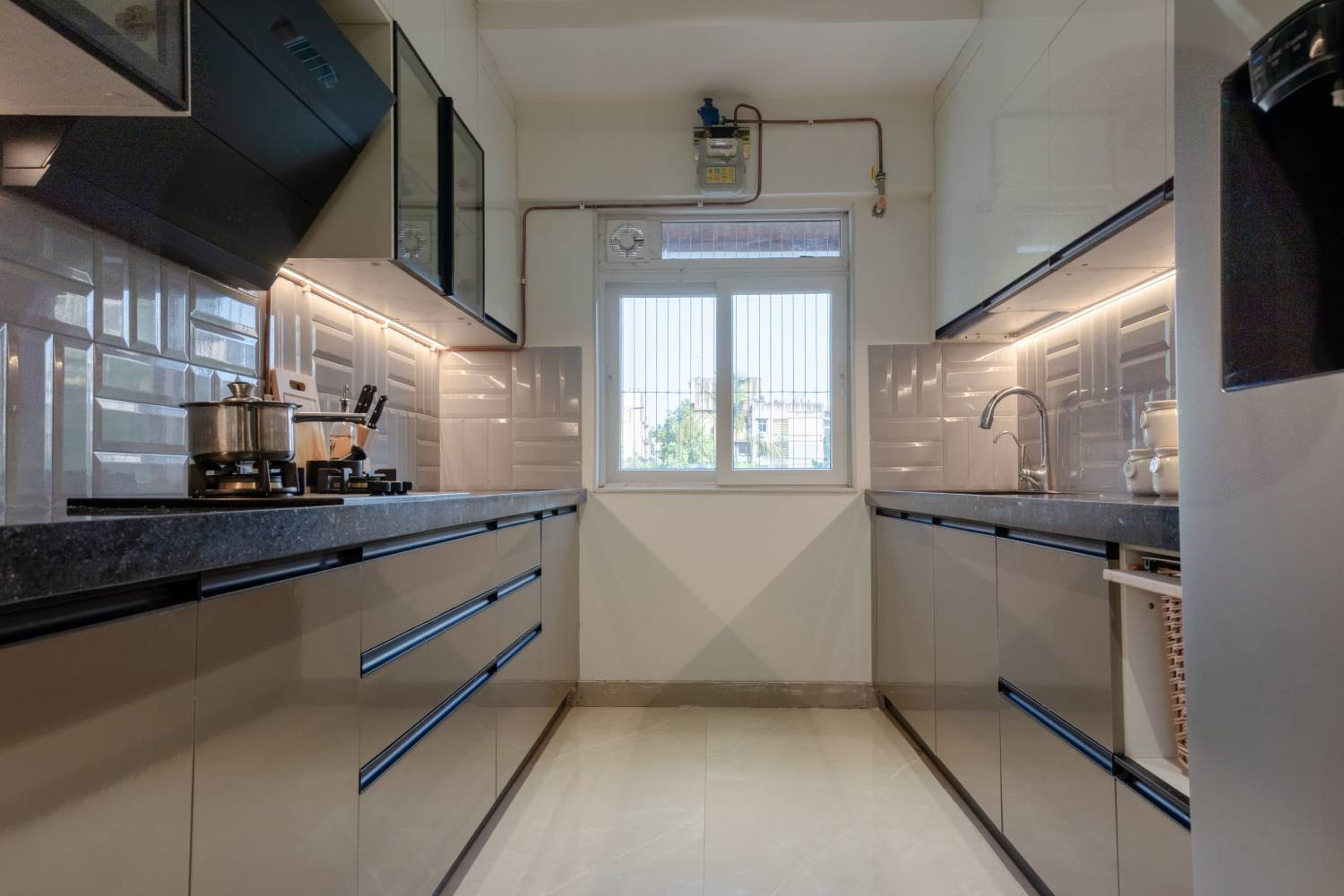 Contemporary Parallel Kitchen Design with Grey-White Cabinets and Granite Top