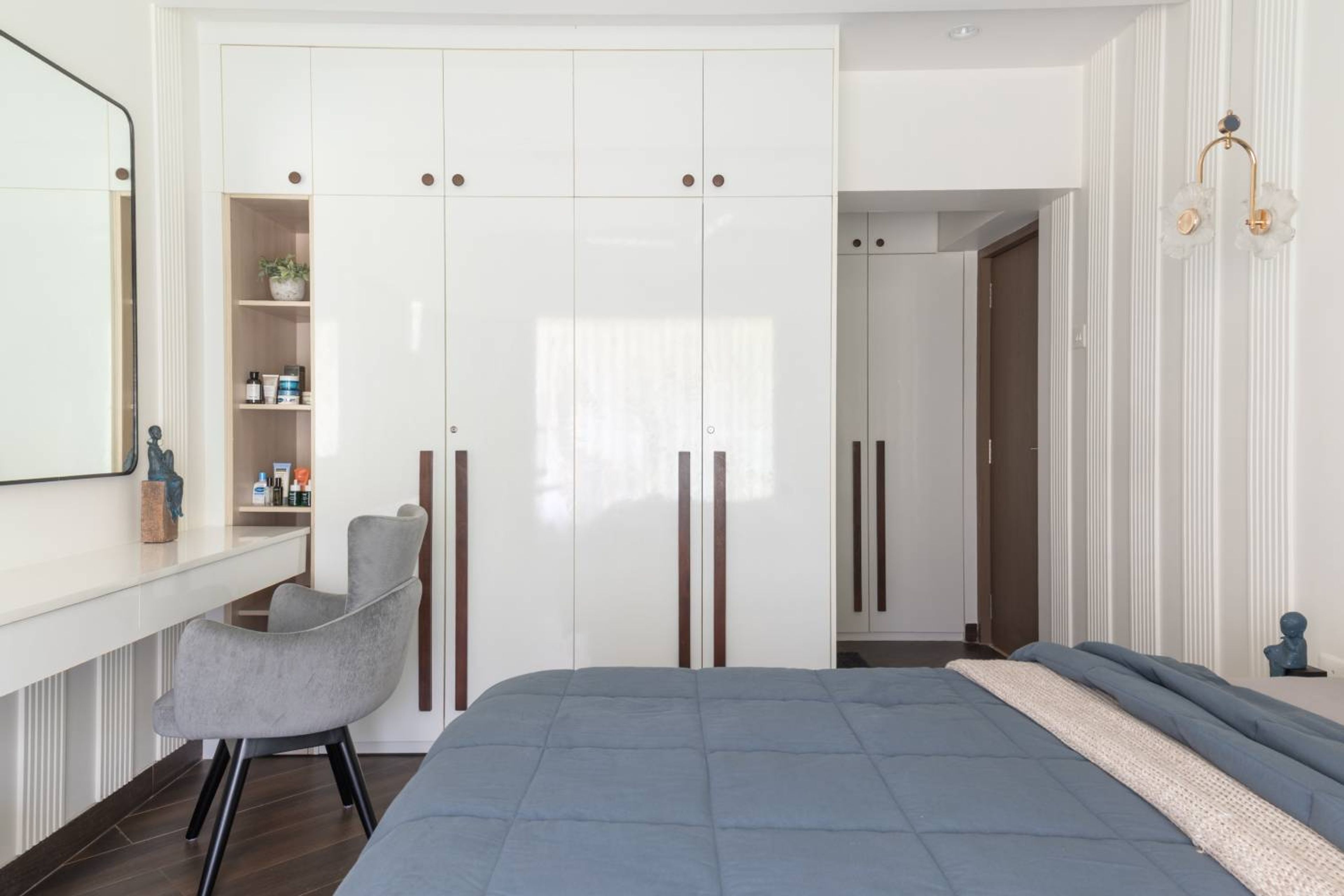 Bedroom Design with 4-Door Off White Swing Wardrobe and Open Storage Units
