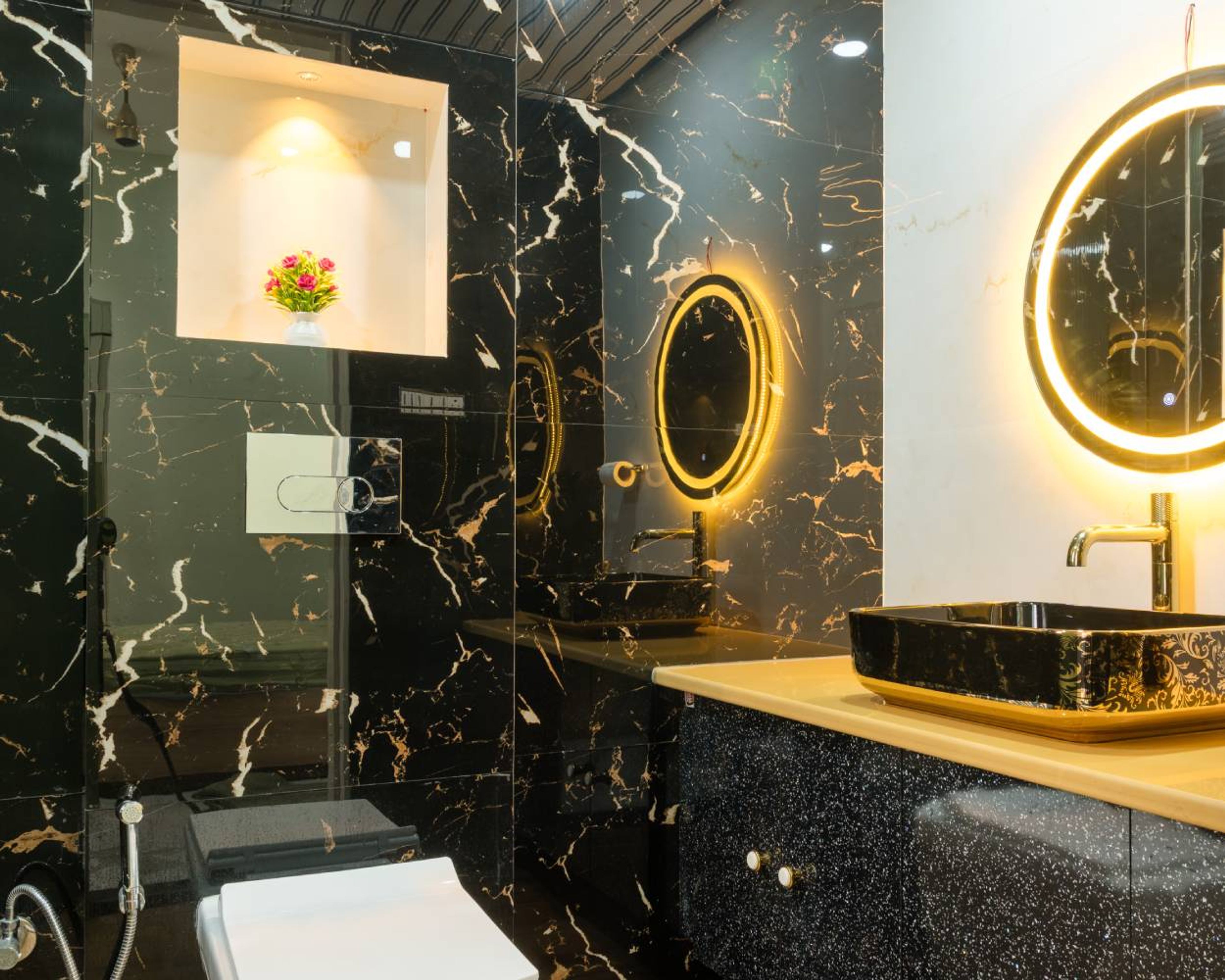 Bathroom design with black marble textured wall