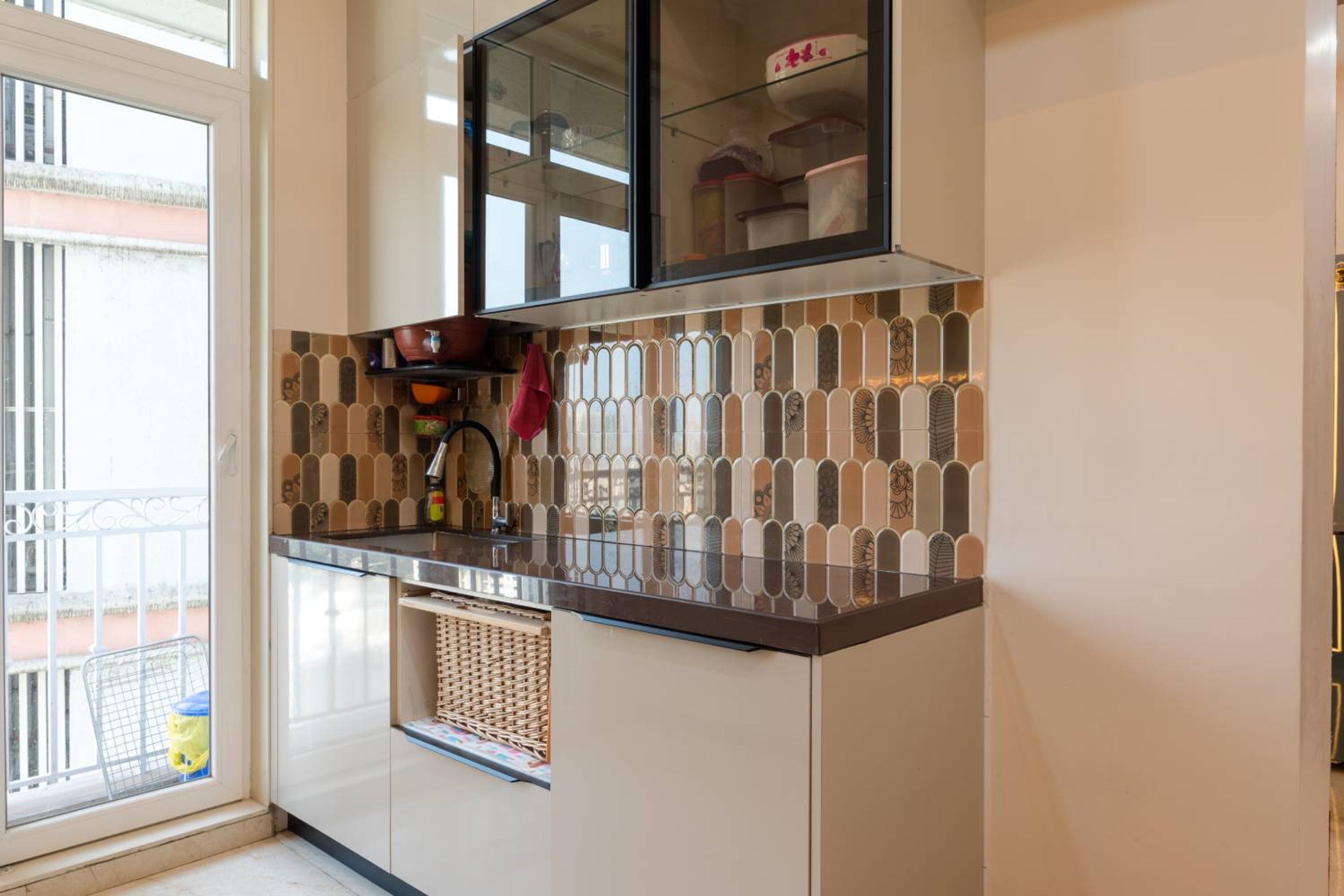 Parallel kitchen design with granite countertop and moroccan tiles backsplash