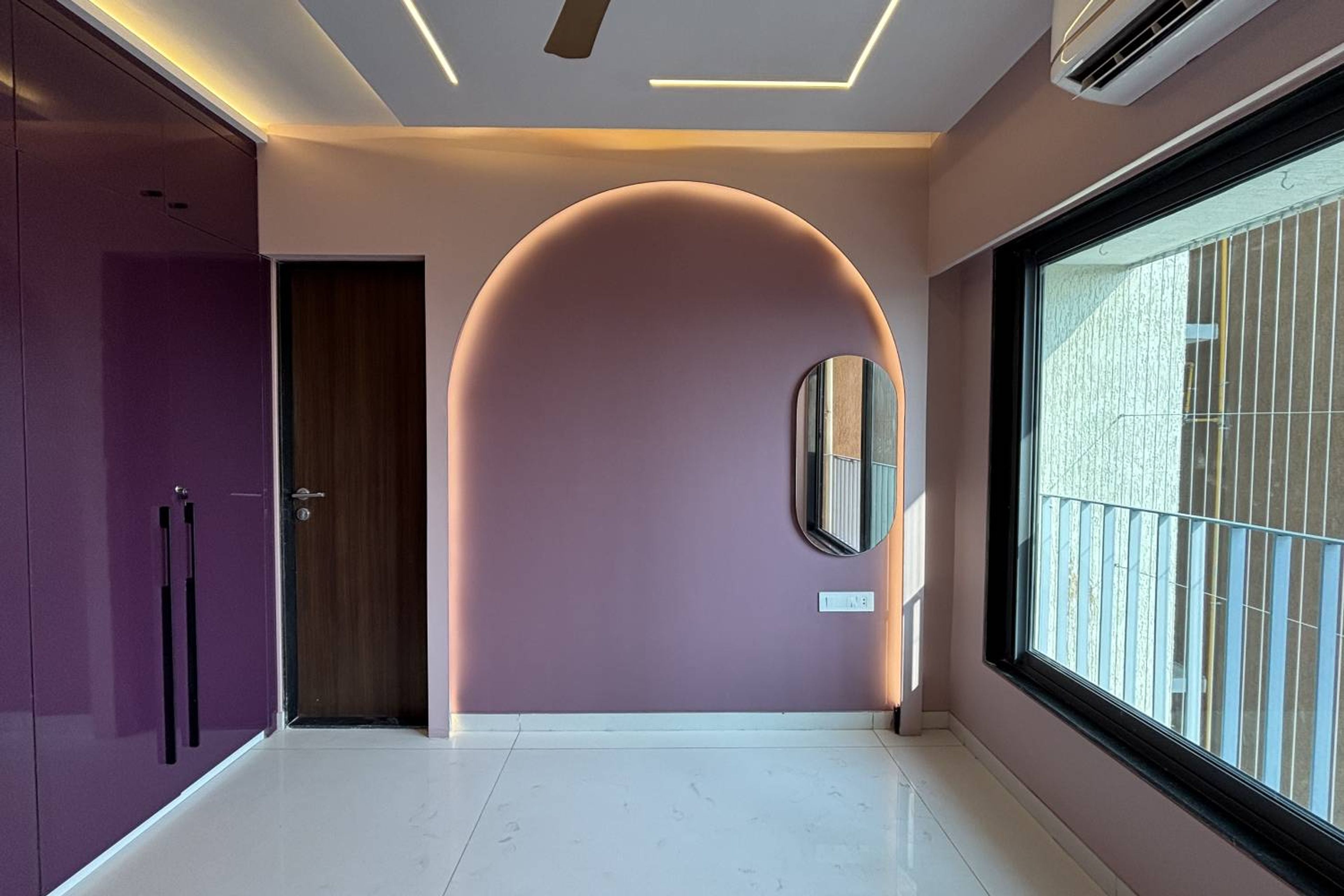 Bedroom Design with Arched Wall Design and Purple 4-Door Swing Wardrobe Design