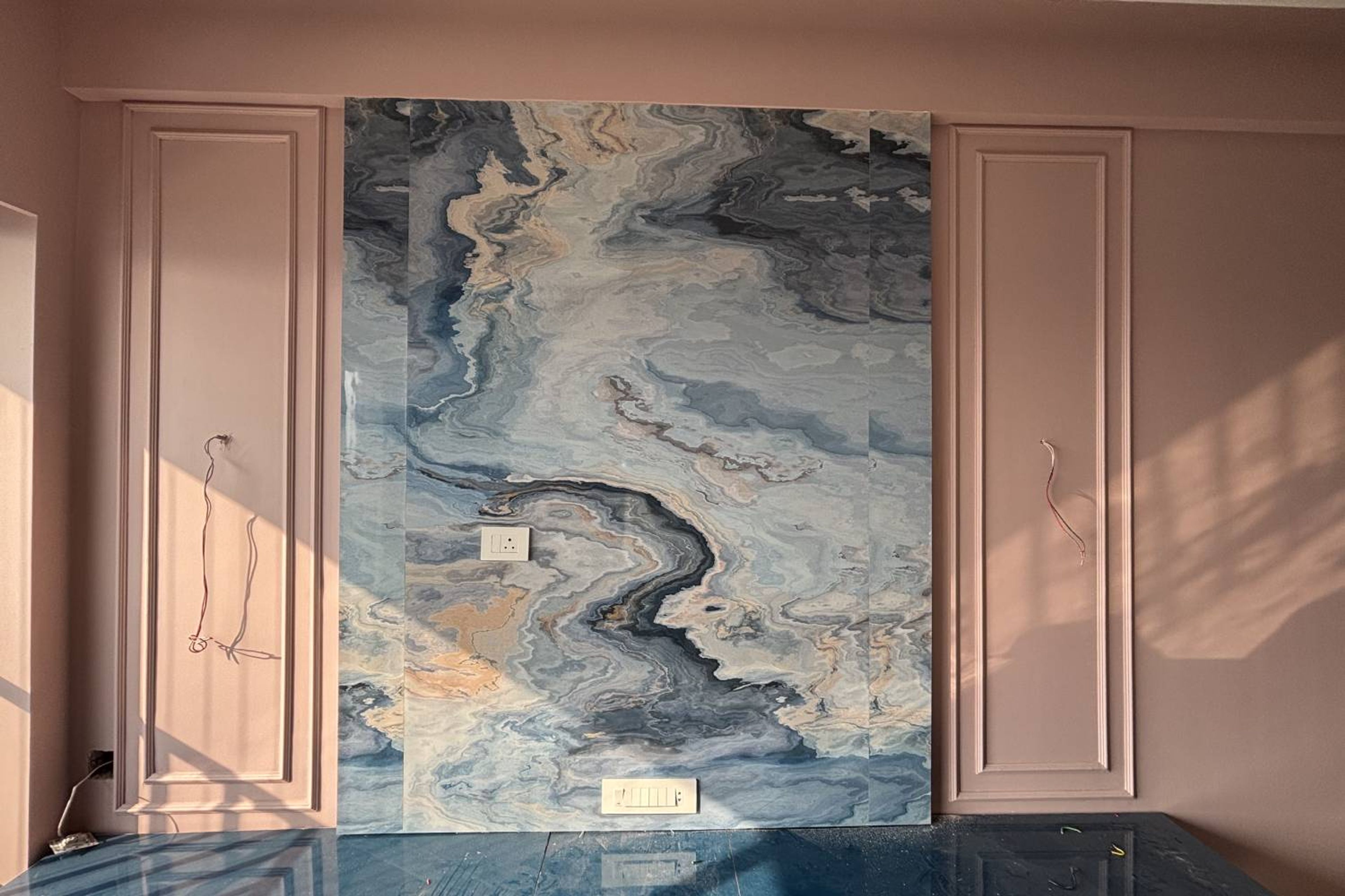 Wall Design with Abstract Patterned Wall with Peach wall with Trims