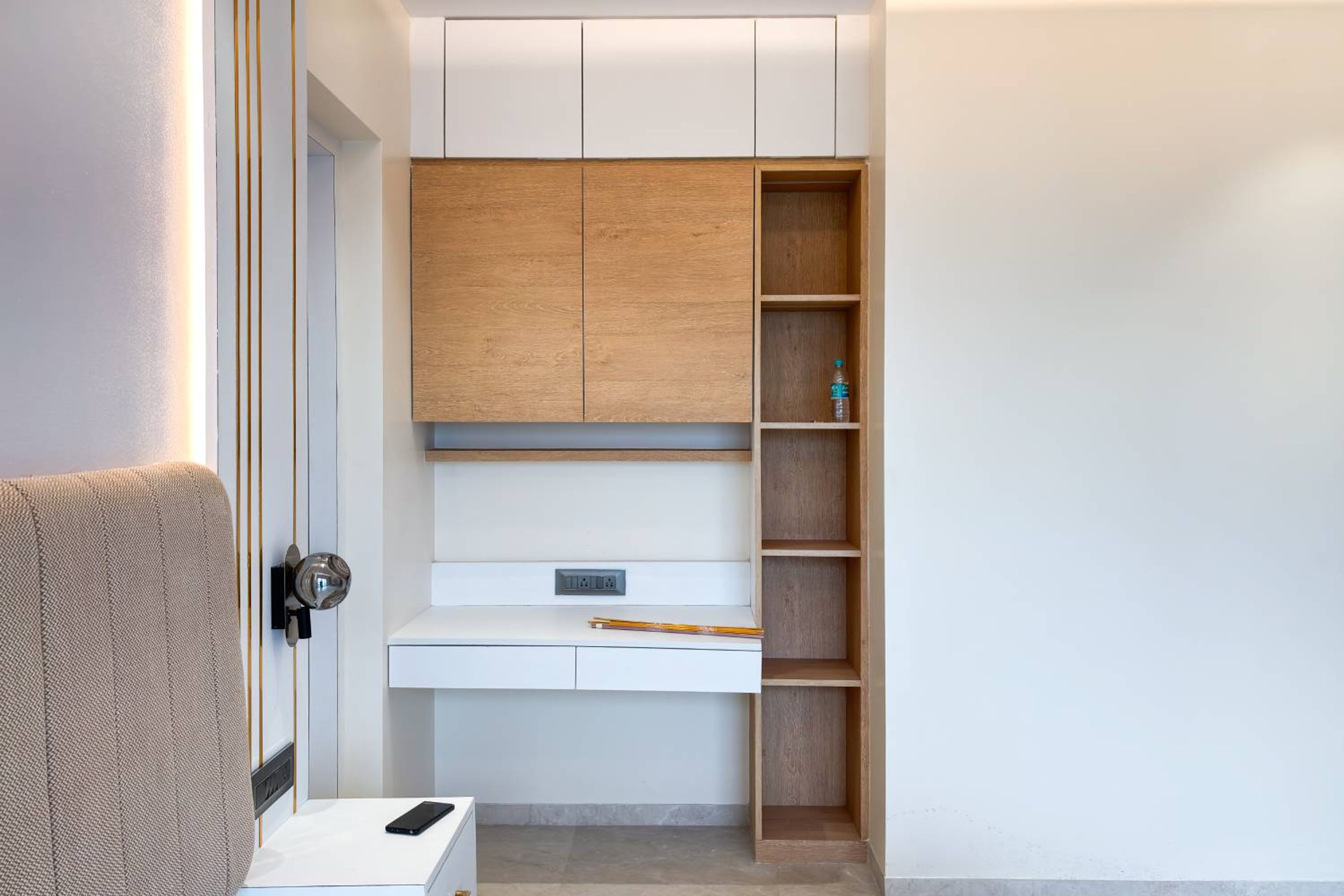 Study Space with White Wall Mounted Desk and Wooden Wall Cabinets and Tall Unit