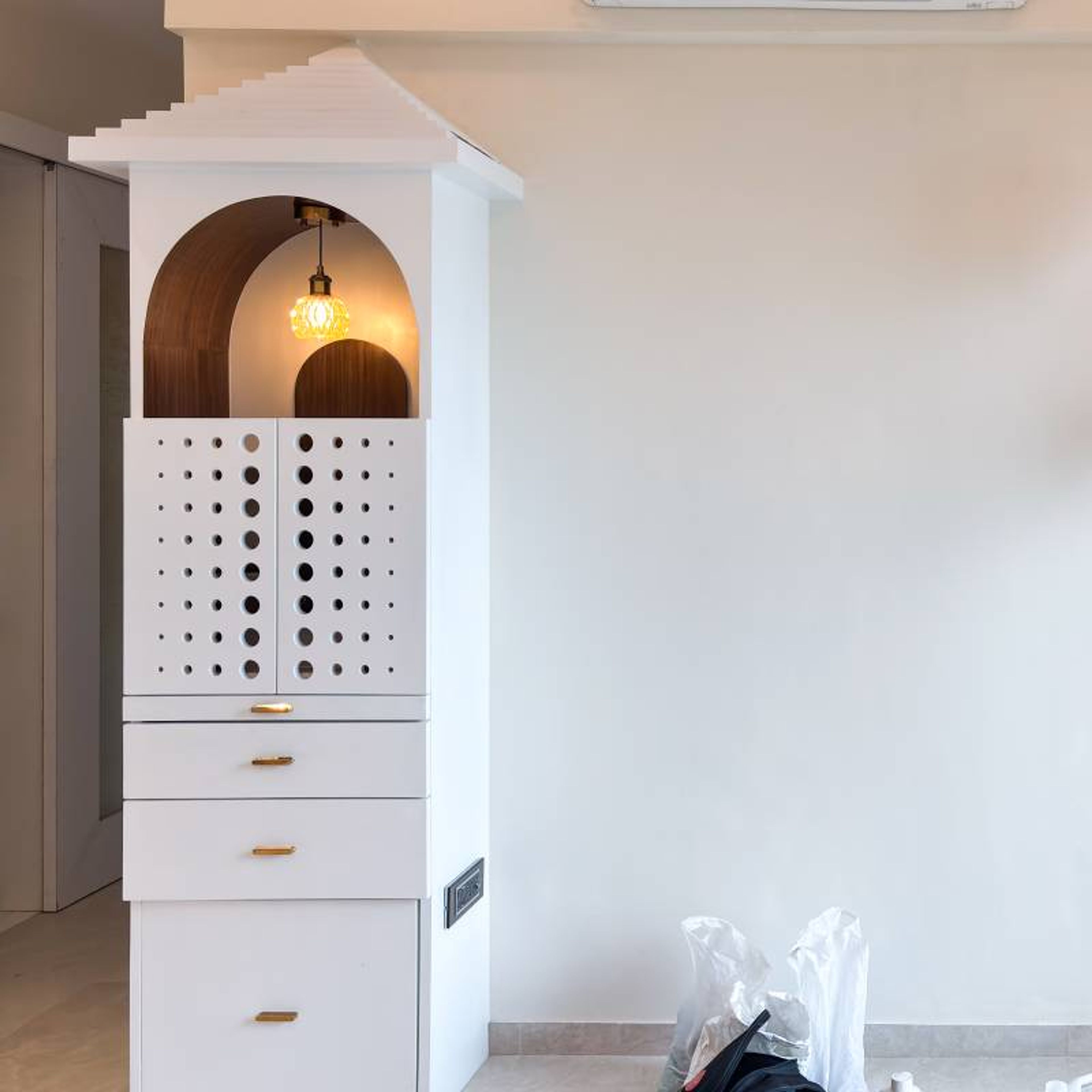 Pooja Room Design with White CNC Cut Door