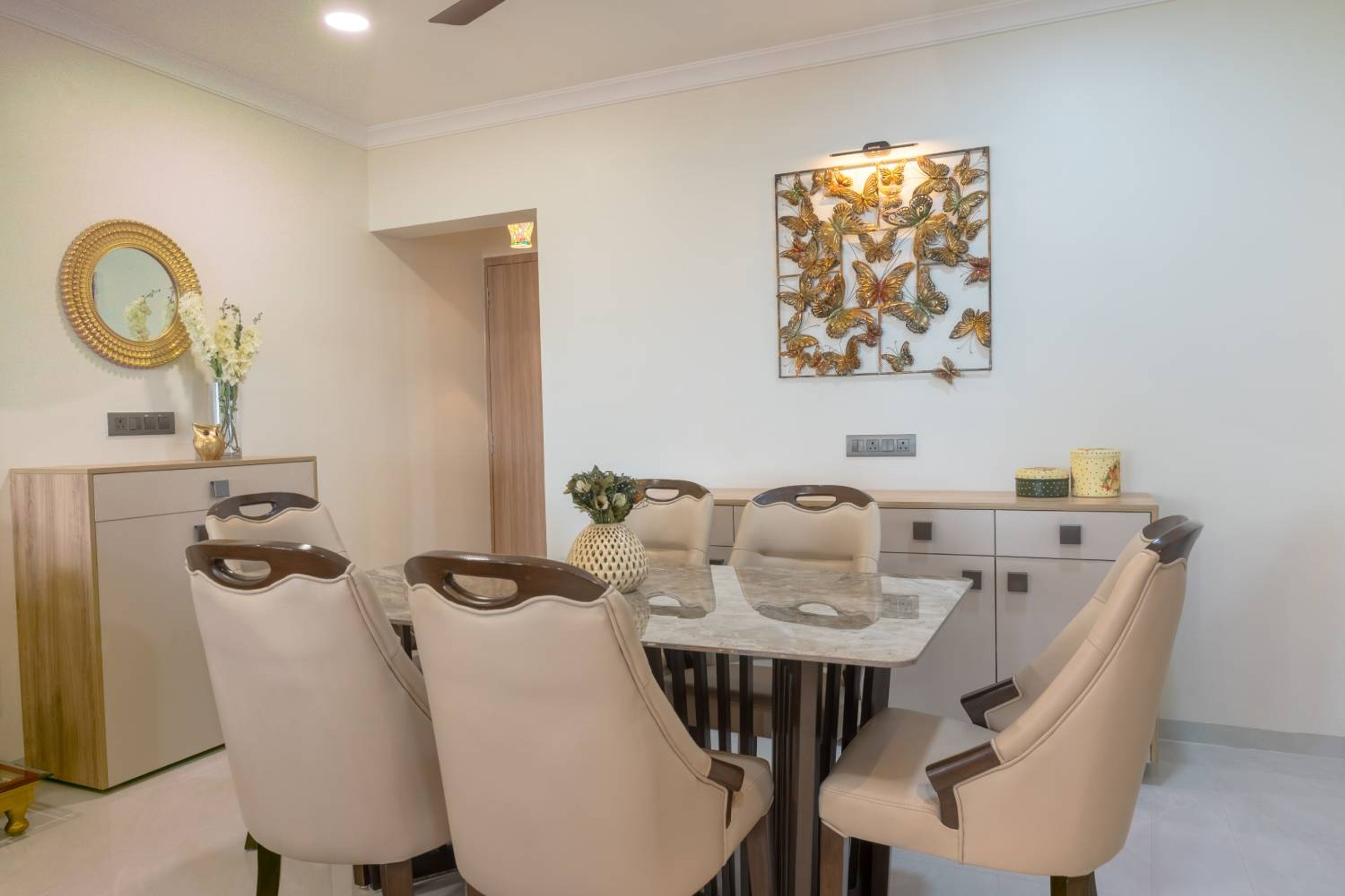 6-Seater Dining Room Design with Light  Brown Chairs and Marble Table