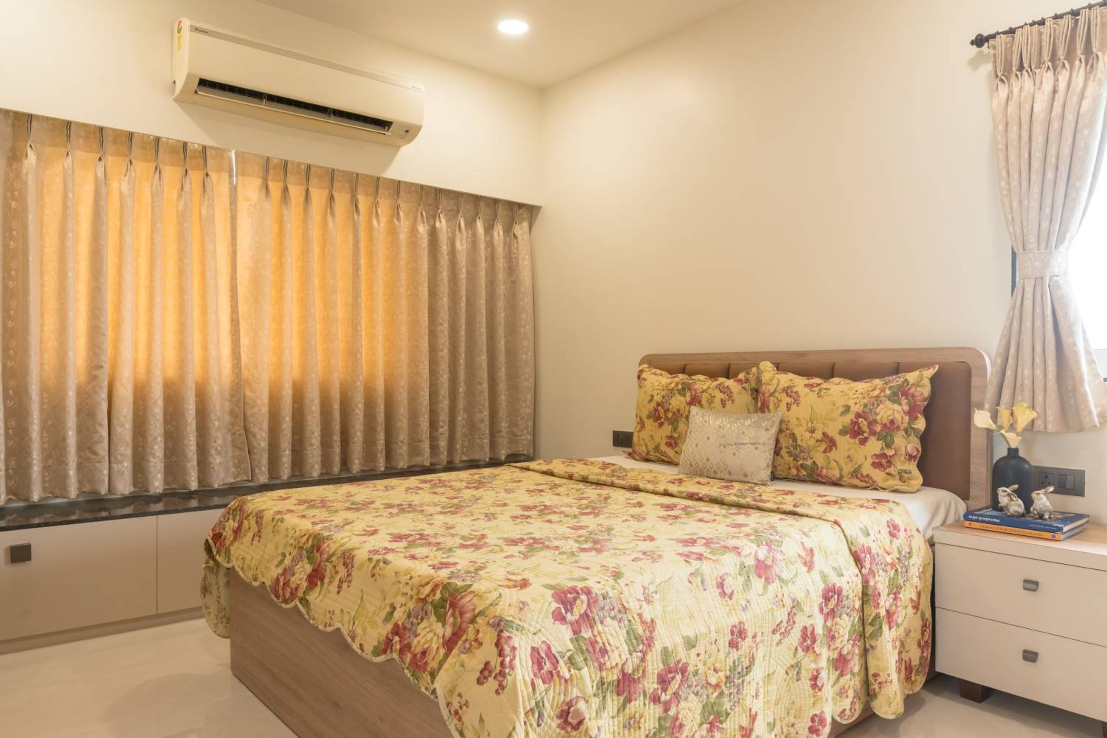 Bedroom Design with Cream Walls and Tufted Headboard Bed