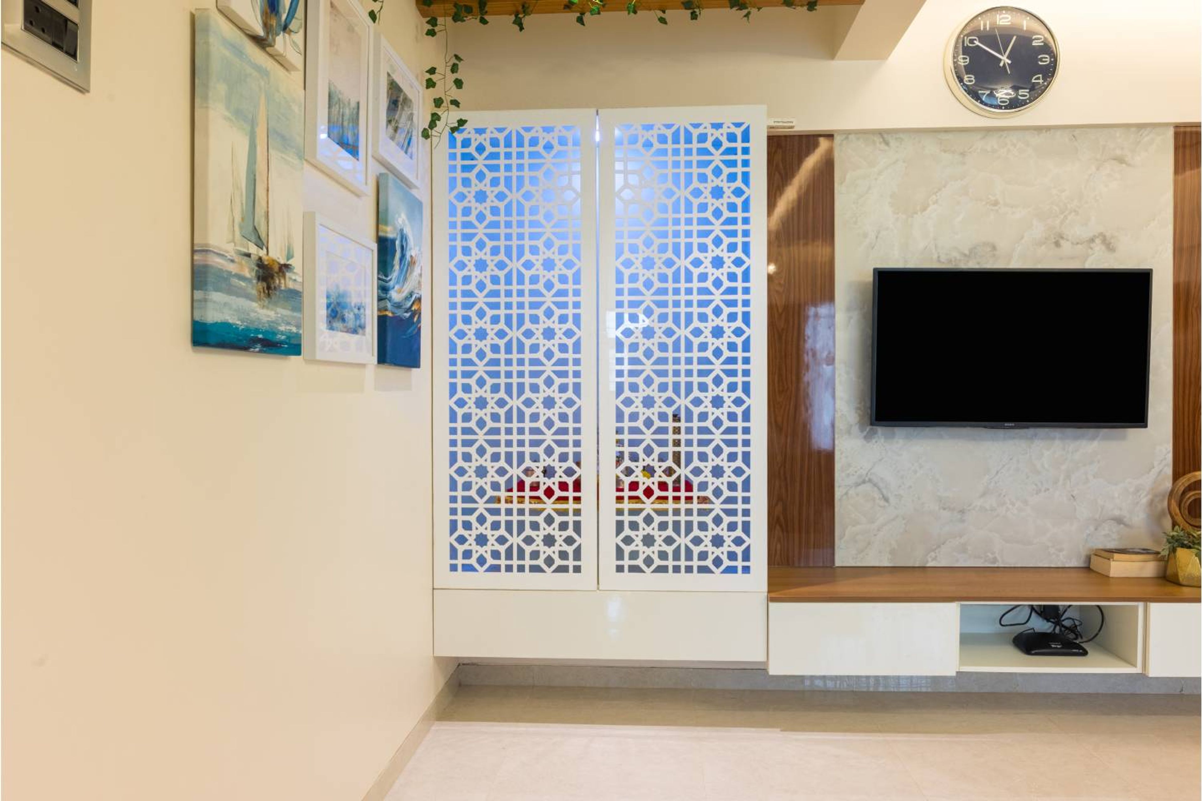 Classic Wall-Mounted Pooja Design with CNC Doors and Storage