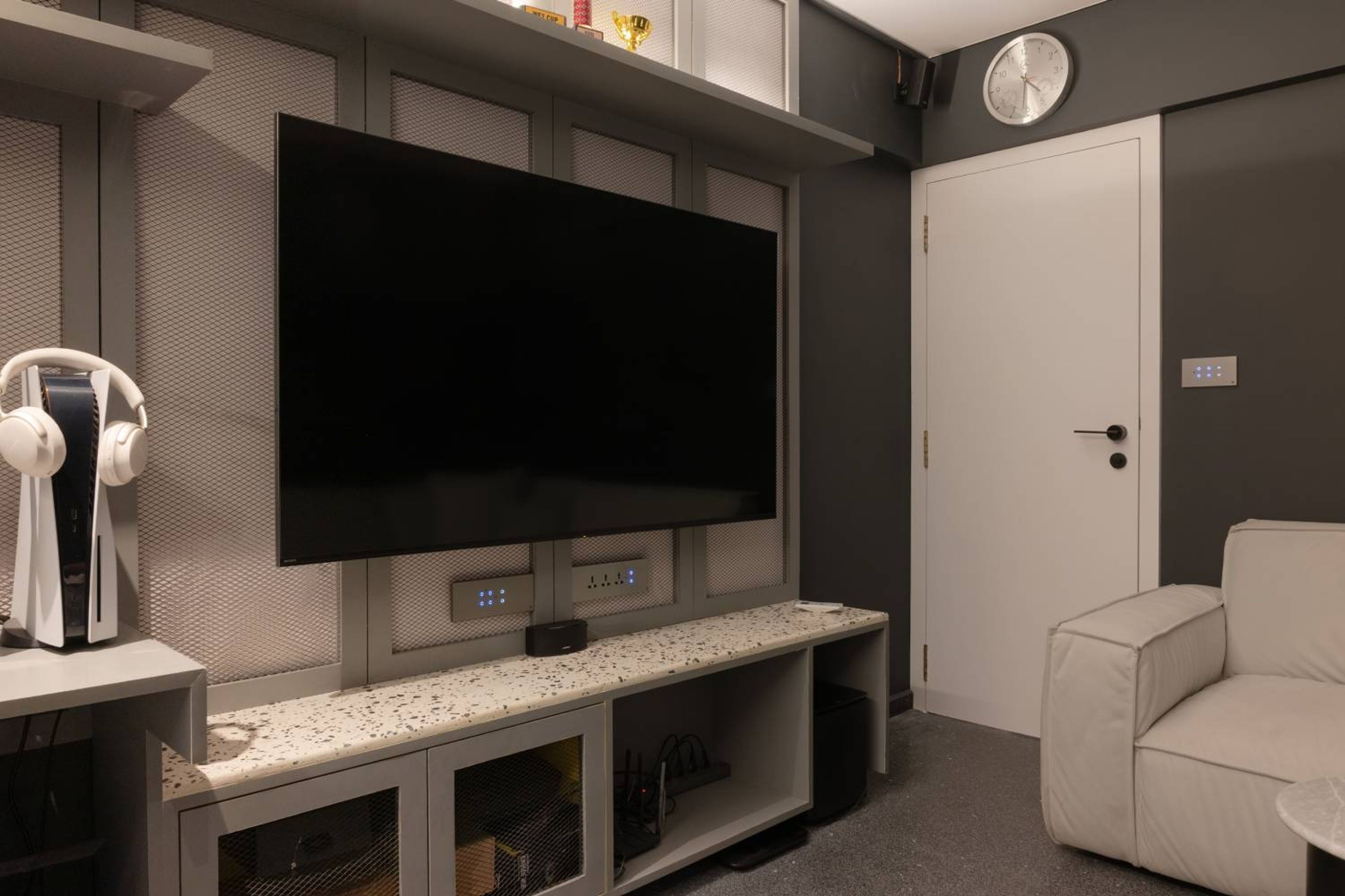TV Unit Design with Grey Mesh Backsplash and Wall Mounted Drawers