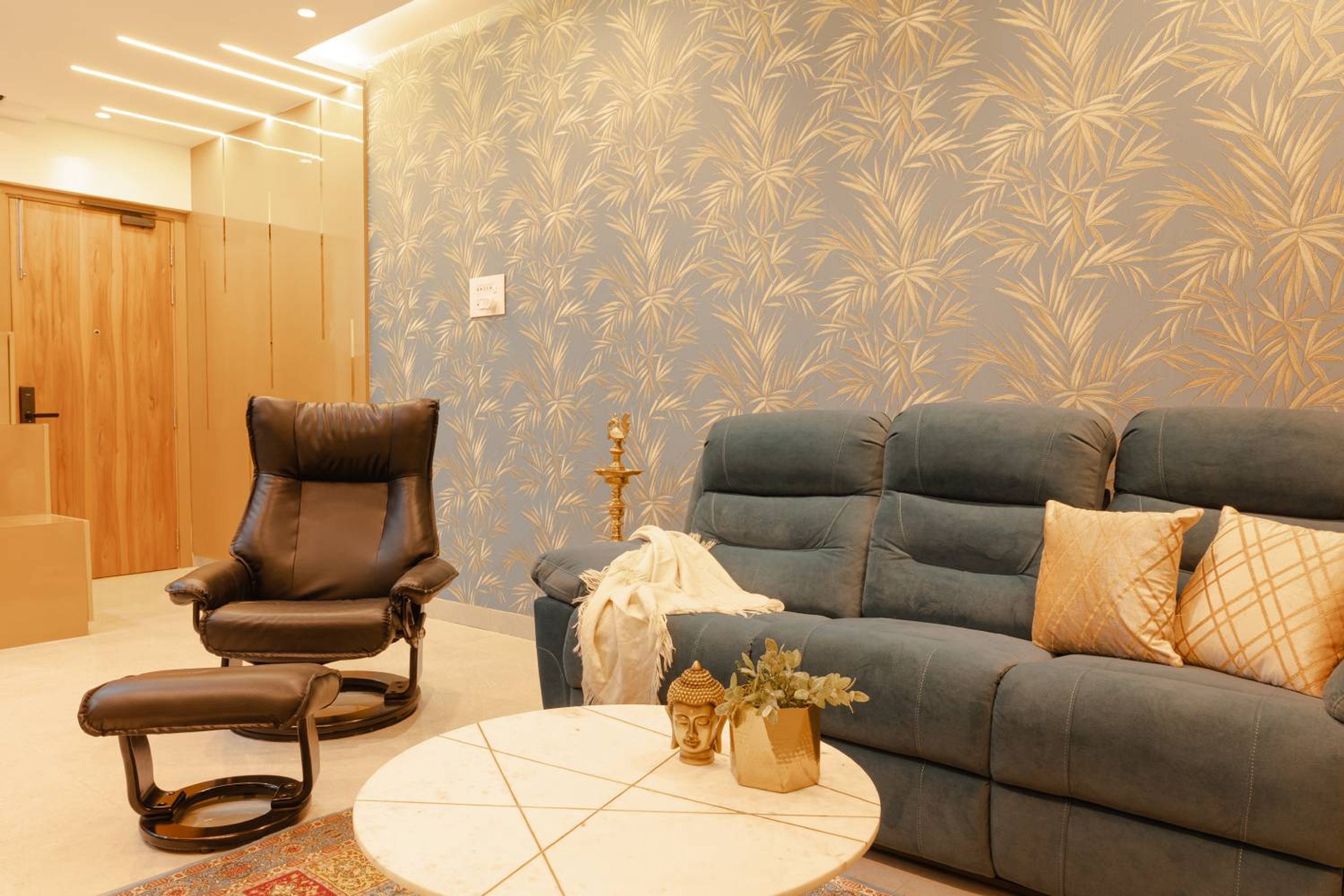 Living room design with grey tropical themed wallpaper