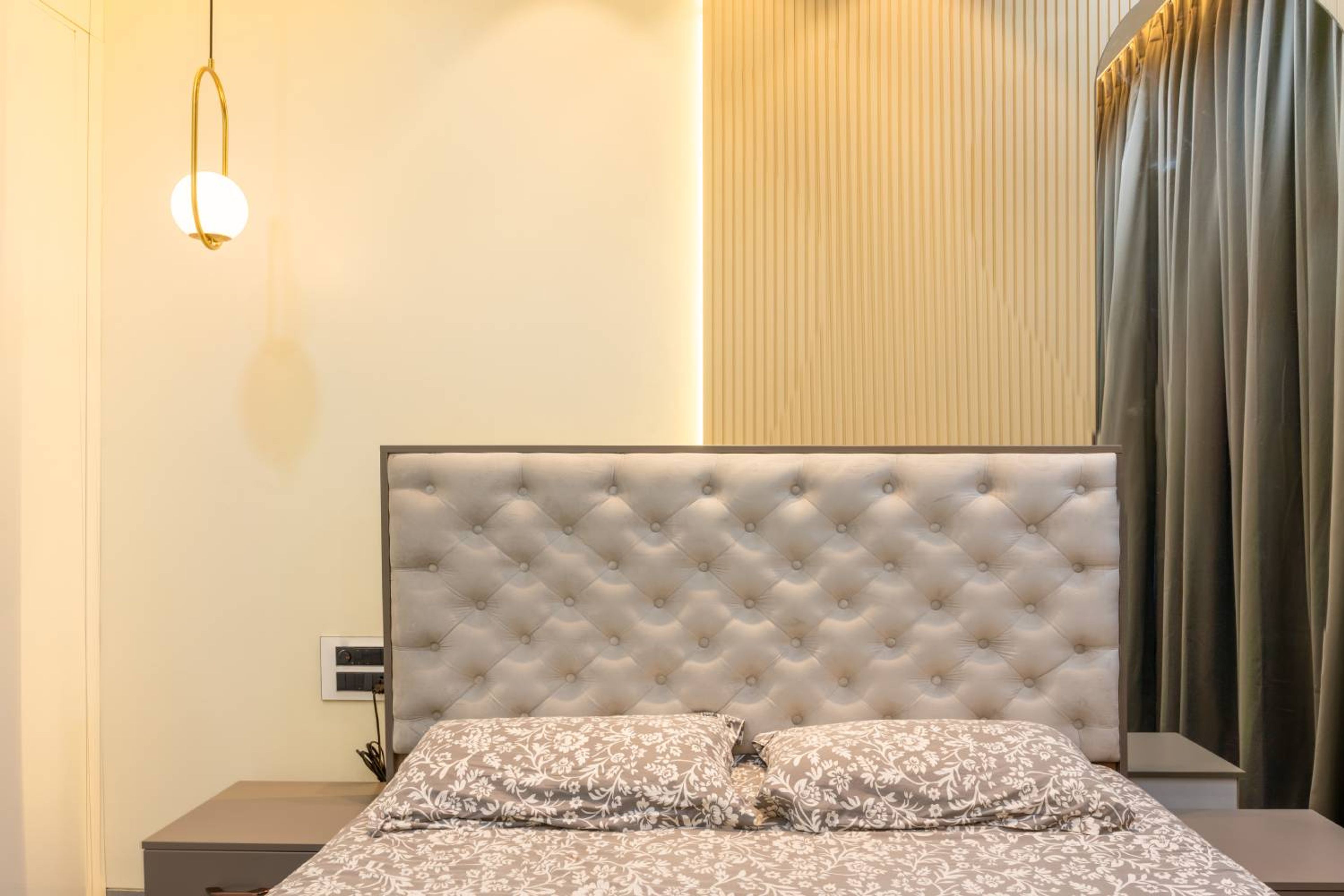 Bedroom Design with Tufted Headboard Bed, Slatted Wall and Pendant Light
