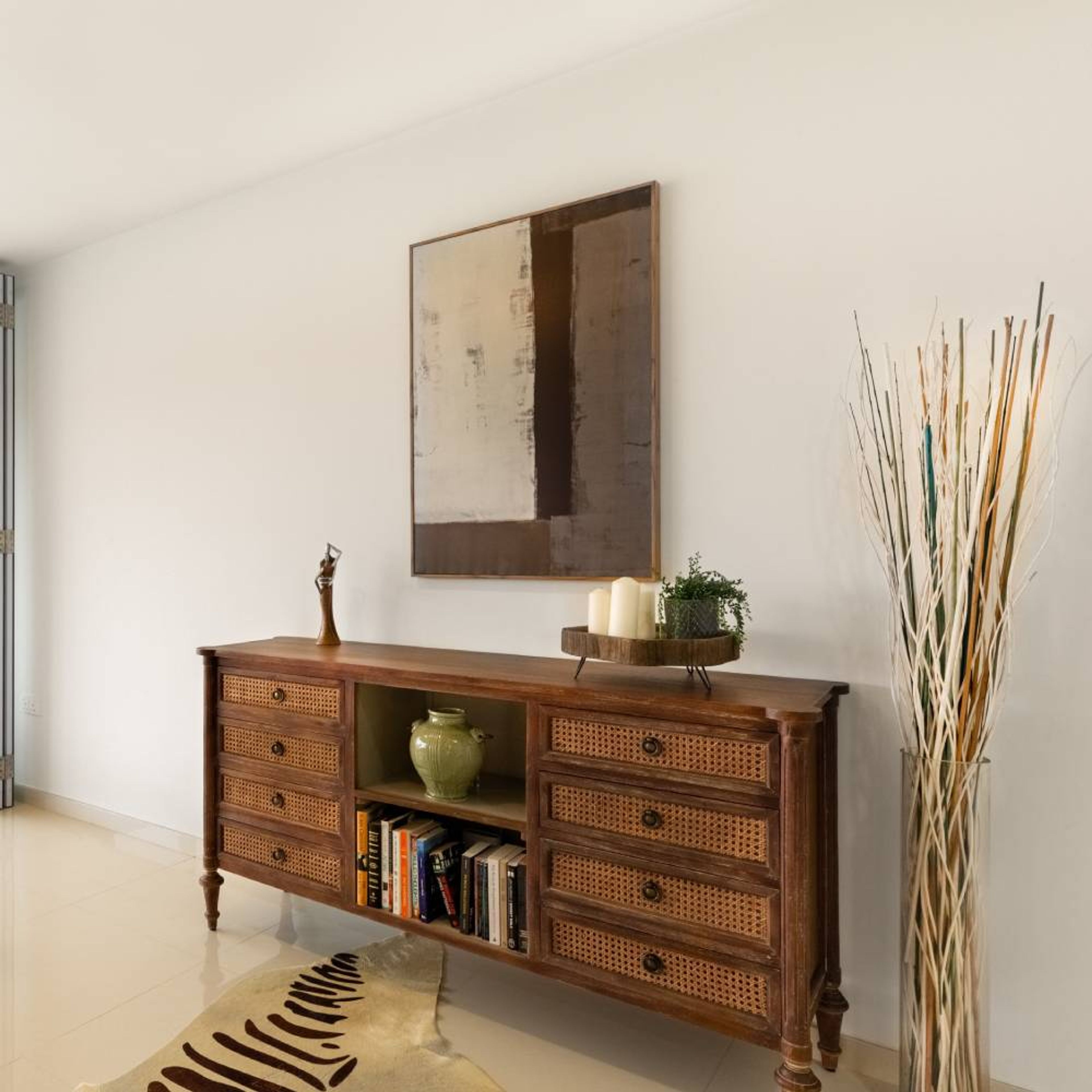 Foyer Design with Wooden Storage Unit, Minimal Wall Art and Rug