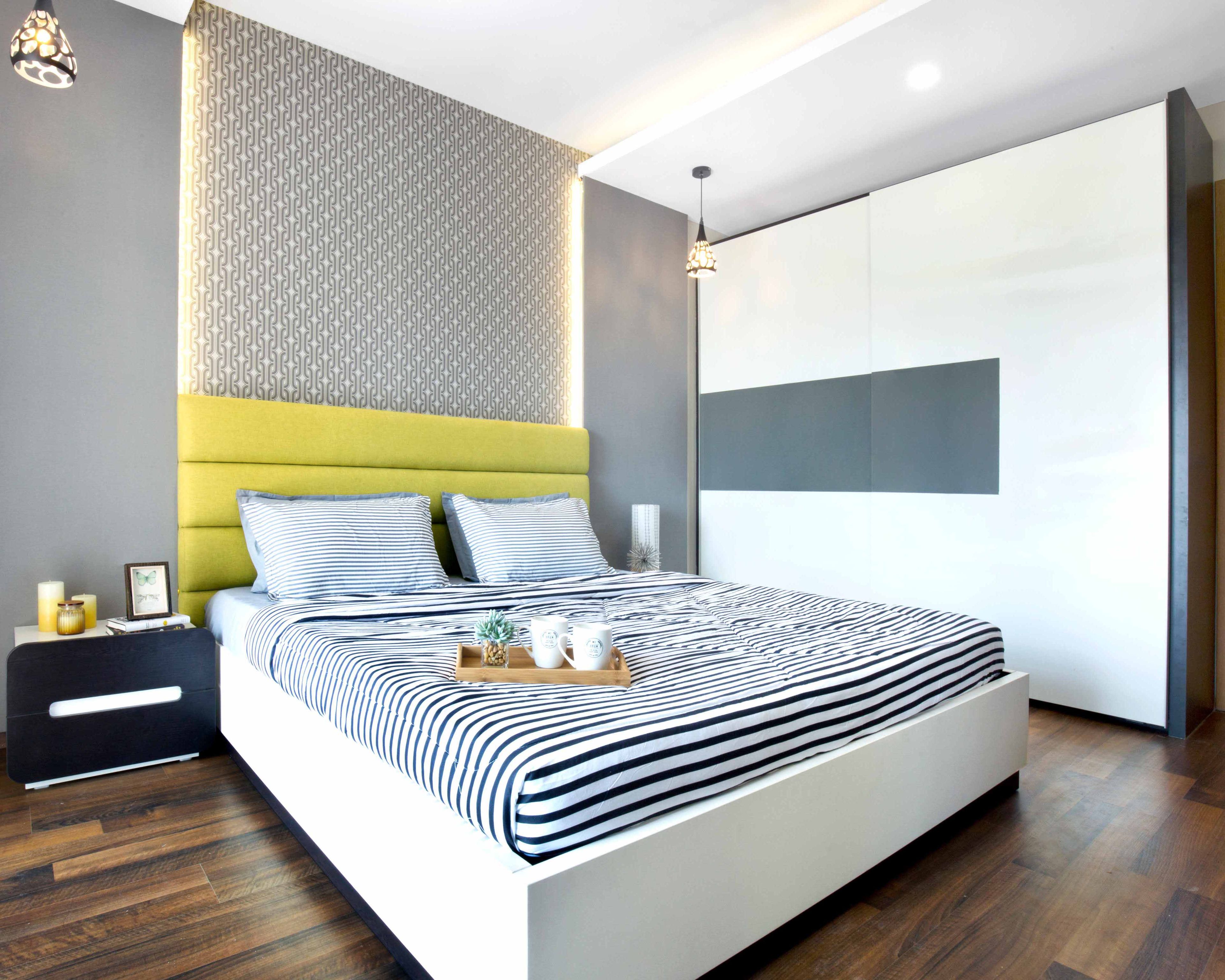 Guest Bedroom Design with Grey Pattern Wall with Cove Lighting, 2-Door Sliding Wardrobe and Wooden Flooring