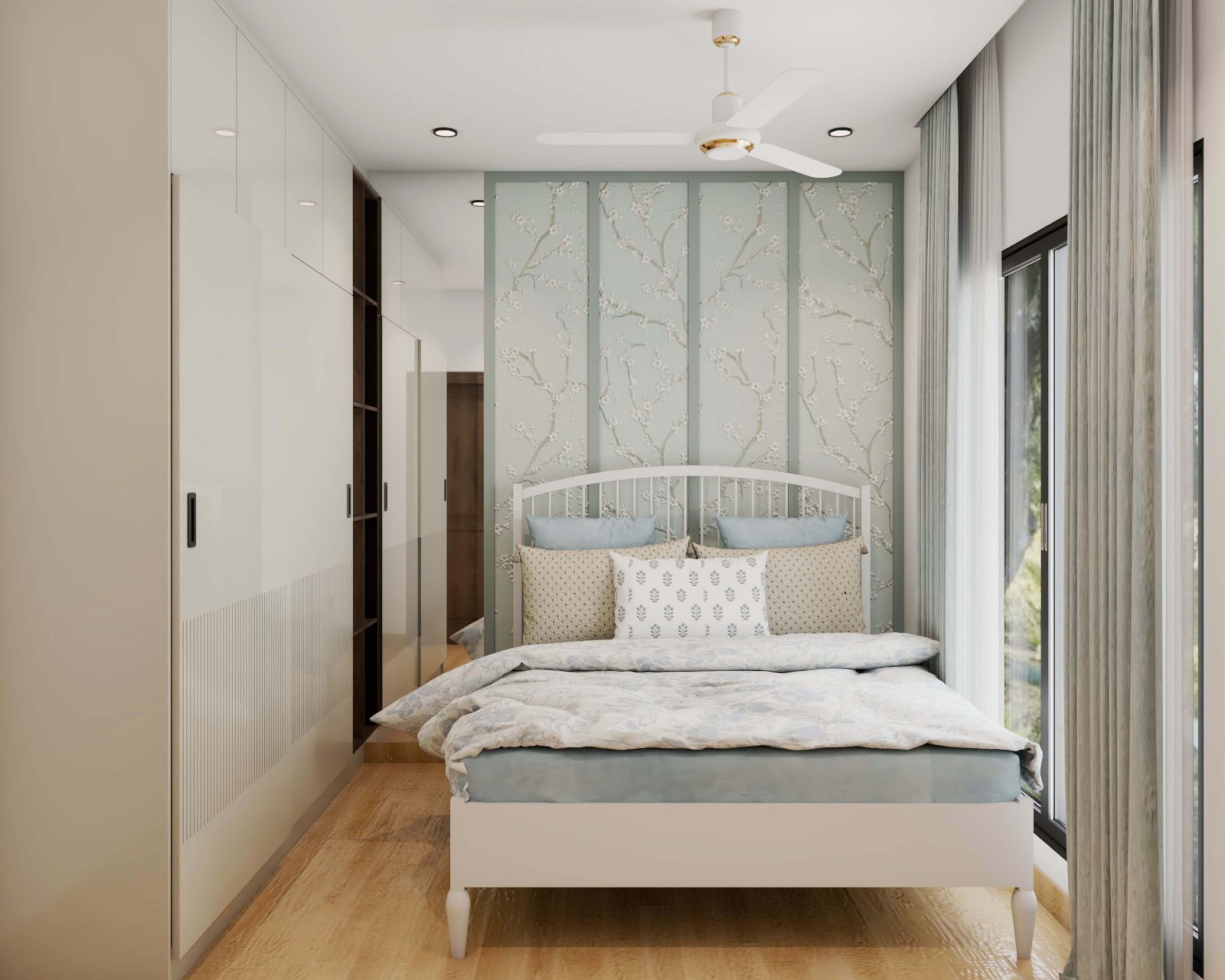 Master Bedroom Design with Cherry Blossom Themed Light Blue Wall, Full Length Wall-Mounted Mirror, Open Wooden Shelf, and 2-Door Sliding Wardrobe