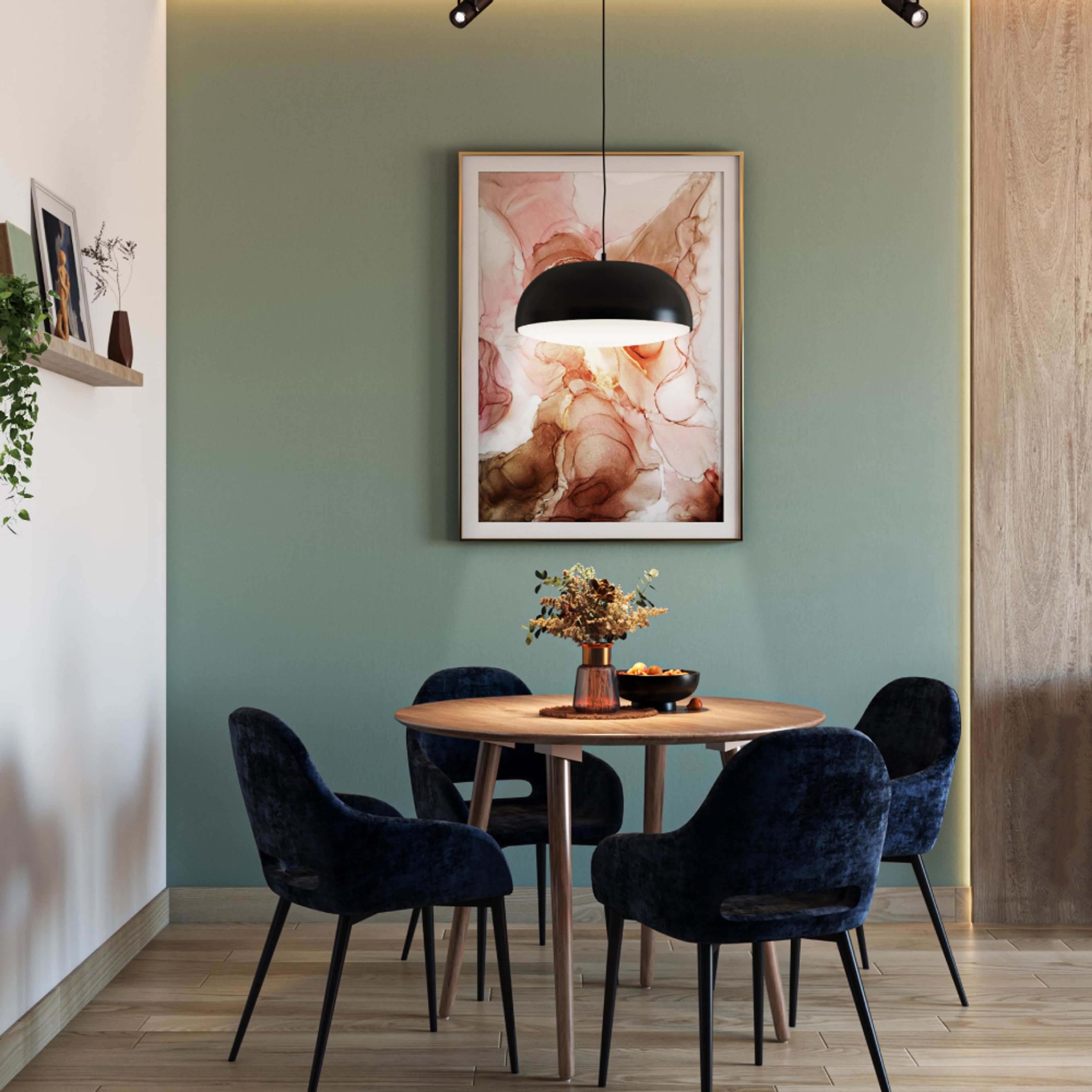 4-Seater Dining Room Design with Round Dining Table, Dark Blue Velvet Chairs, and Sage Green Wall