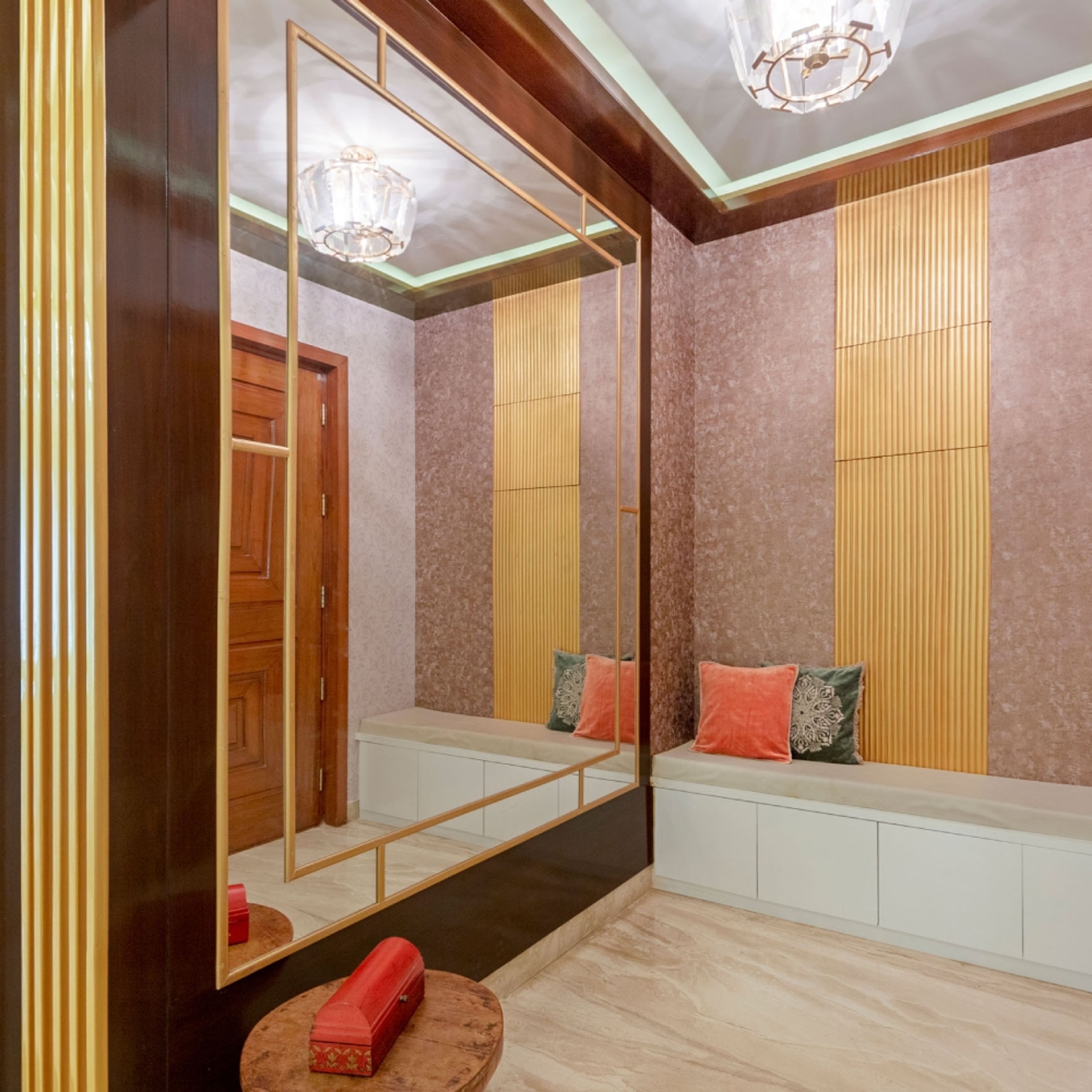 Foyer Design with Shoe Cabinet Under Seating Space and Mirror Accent Wall