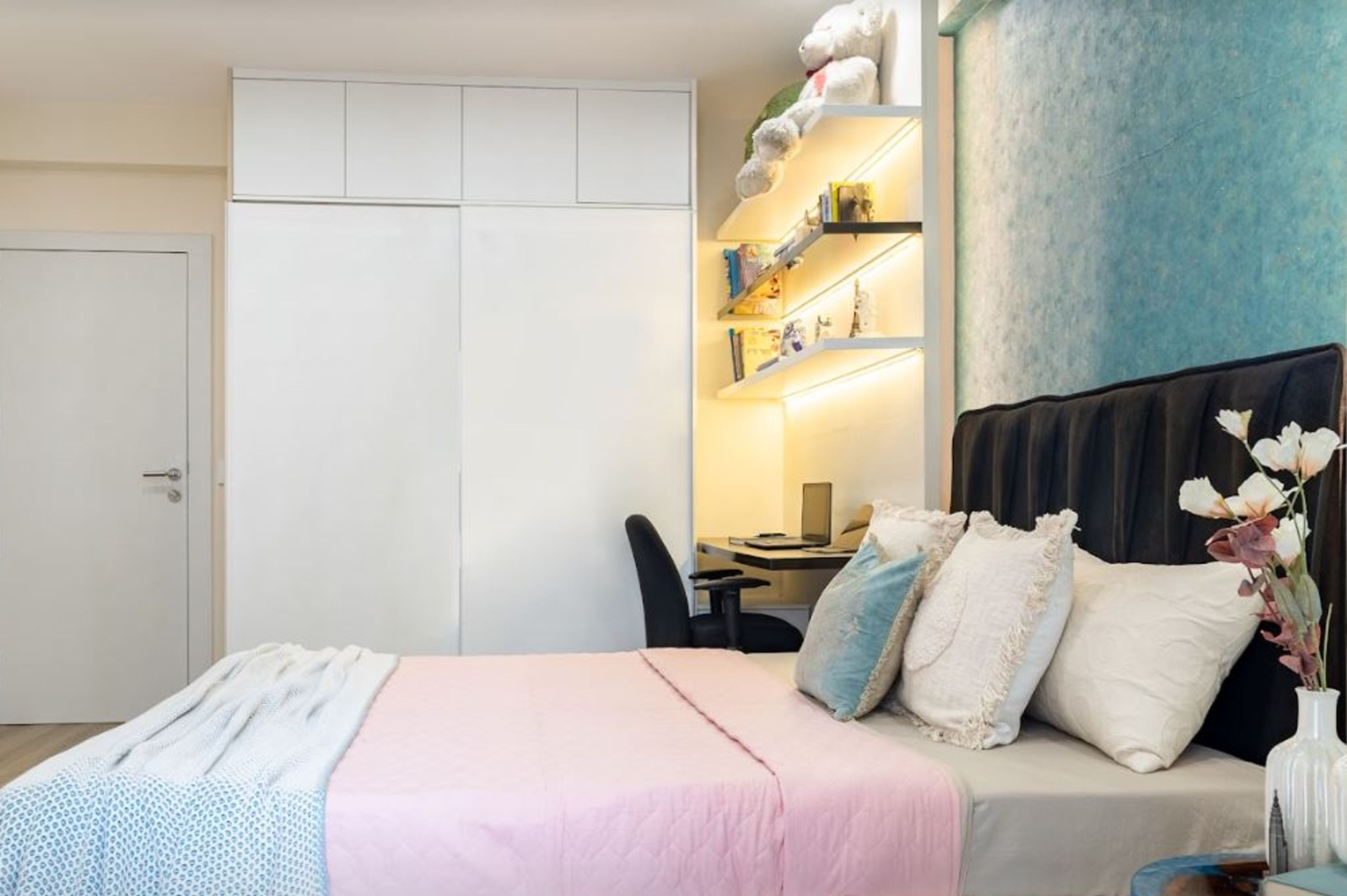 Kids Bedroom Design with Blue Textured Wall, 2-Door Sliding Wardrobe, Study Space with Open Shelves and Black Chair