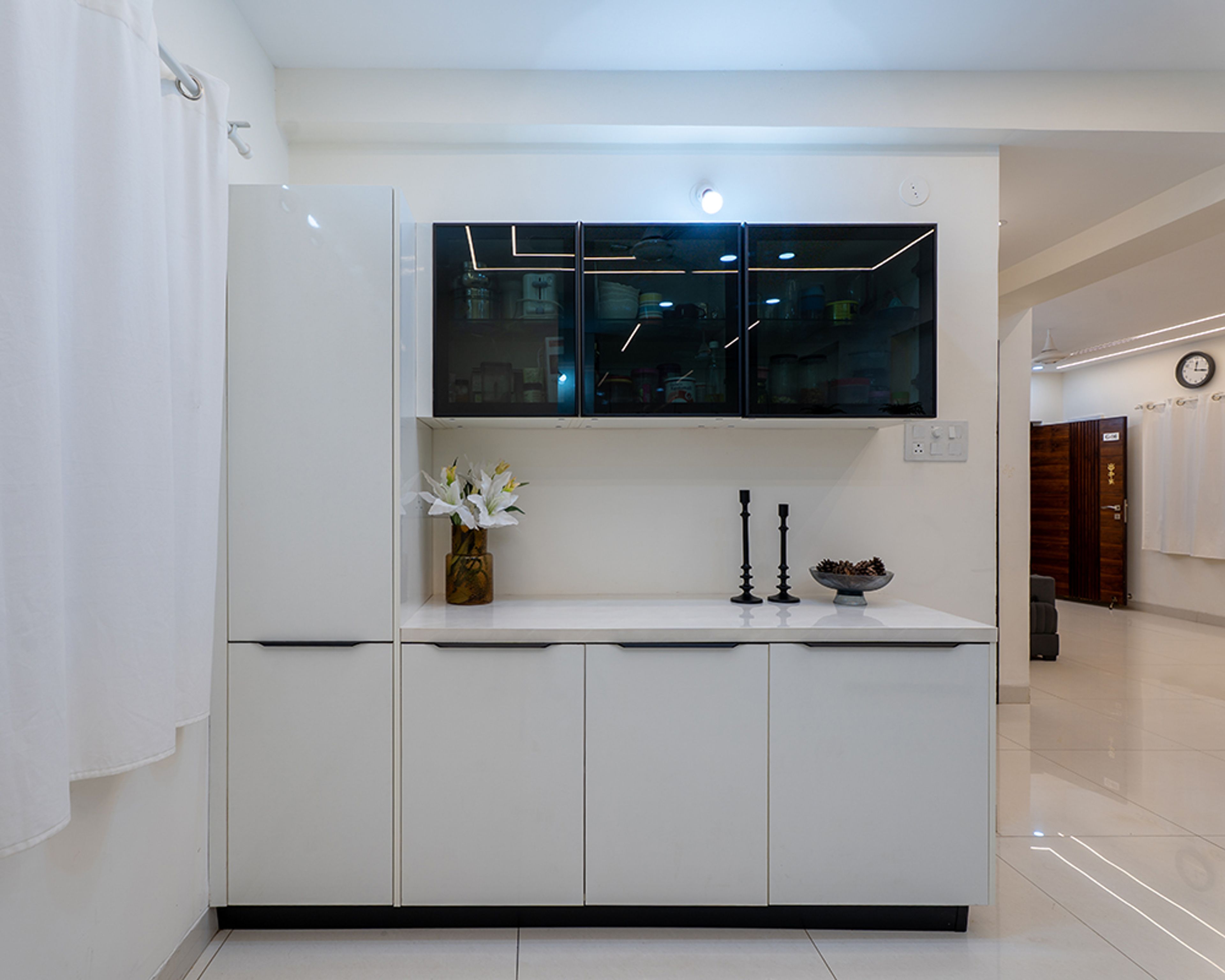 Modern White Crockery Unit Design with Cabinets and Tall Unit