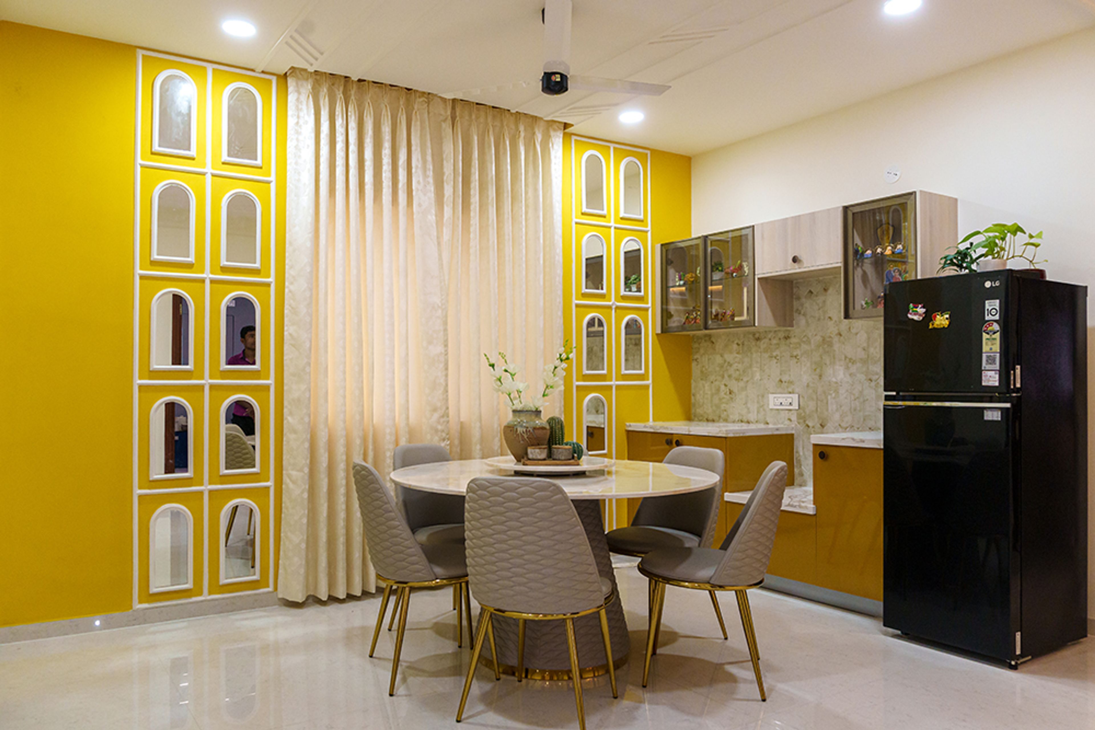 Dining Room Design with Velvet Chairs and Round Marble Pedestal Table