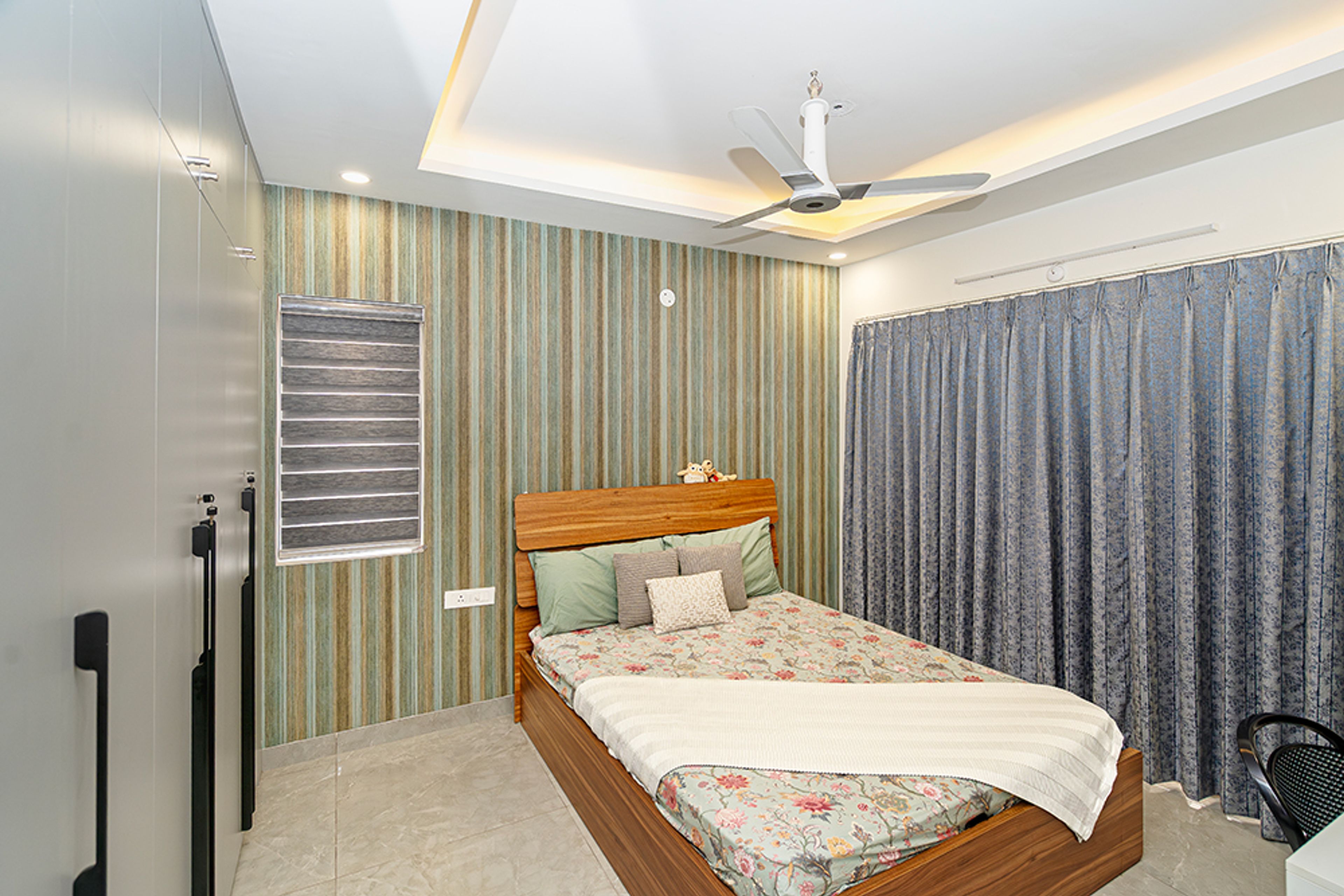 Contemporary Guest Bedroom Design with Wooden Bed and Wardrobe Storage