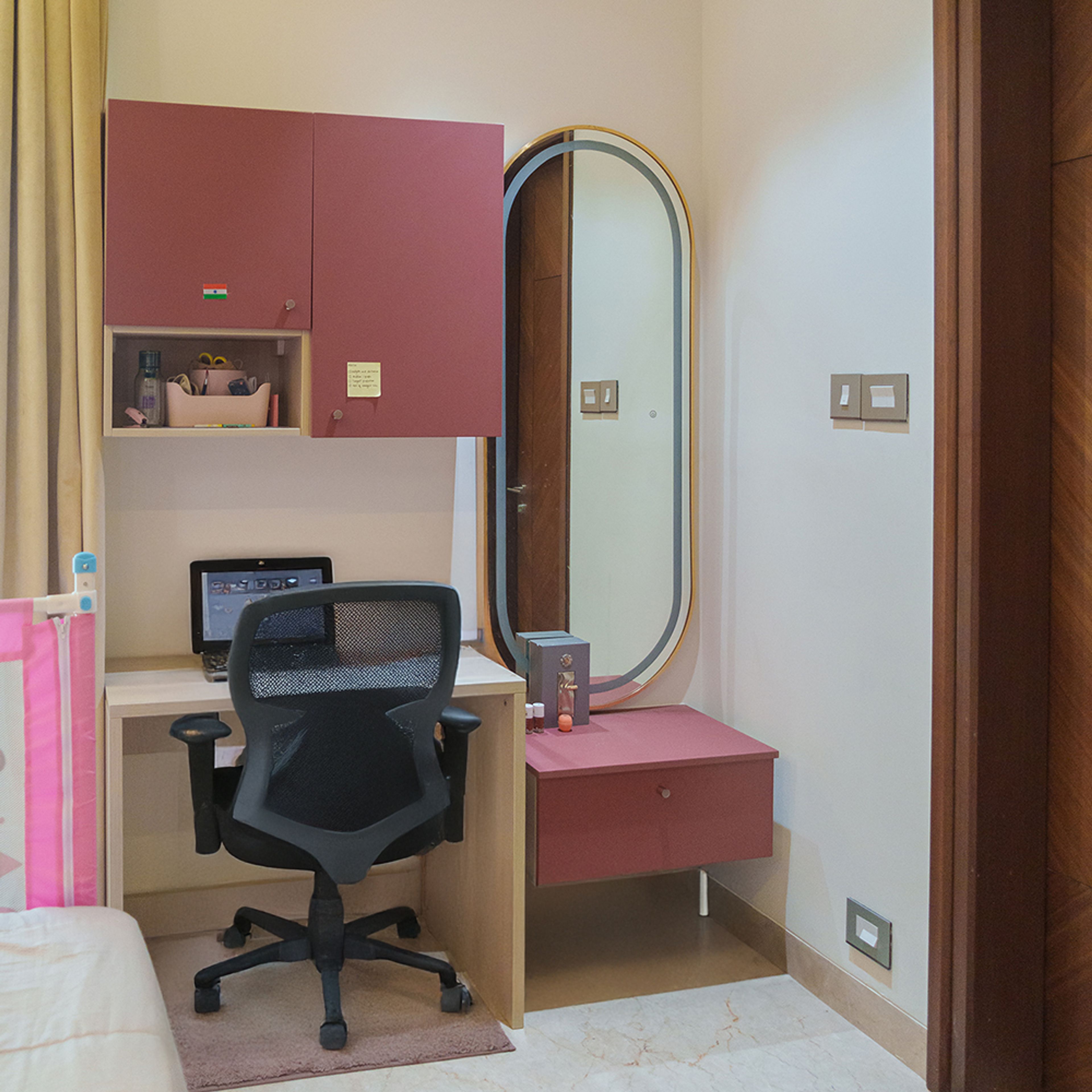 Contemporary Home Office Design With Blush Tones and Floating Storage