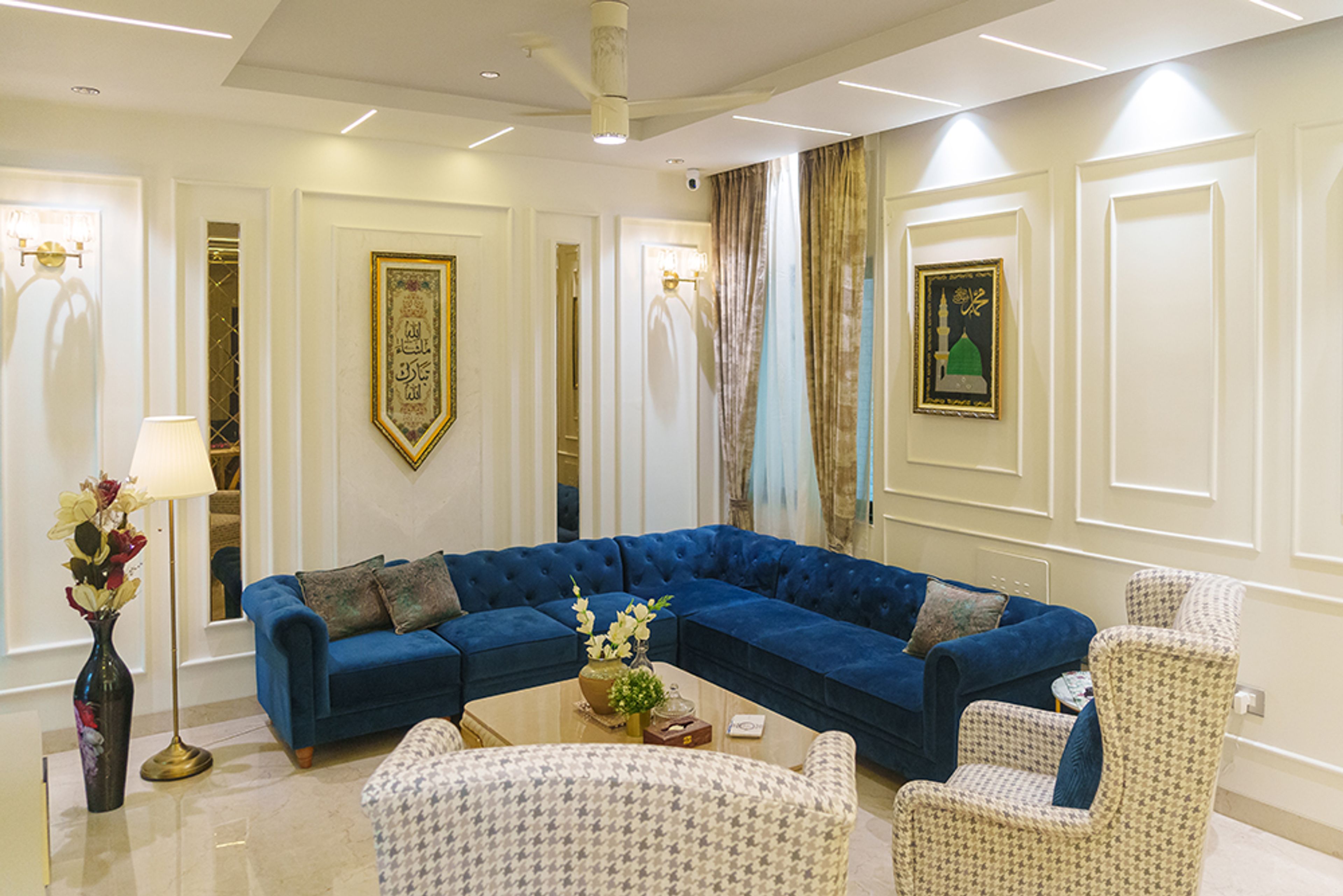 Royal Blue Velvet L-Shaped Sofa in a Classic Living Room Design