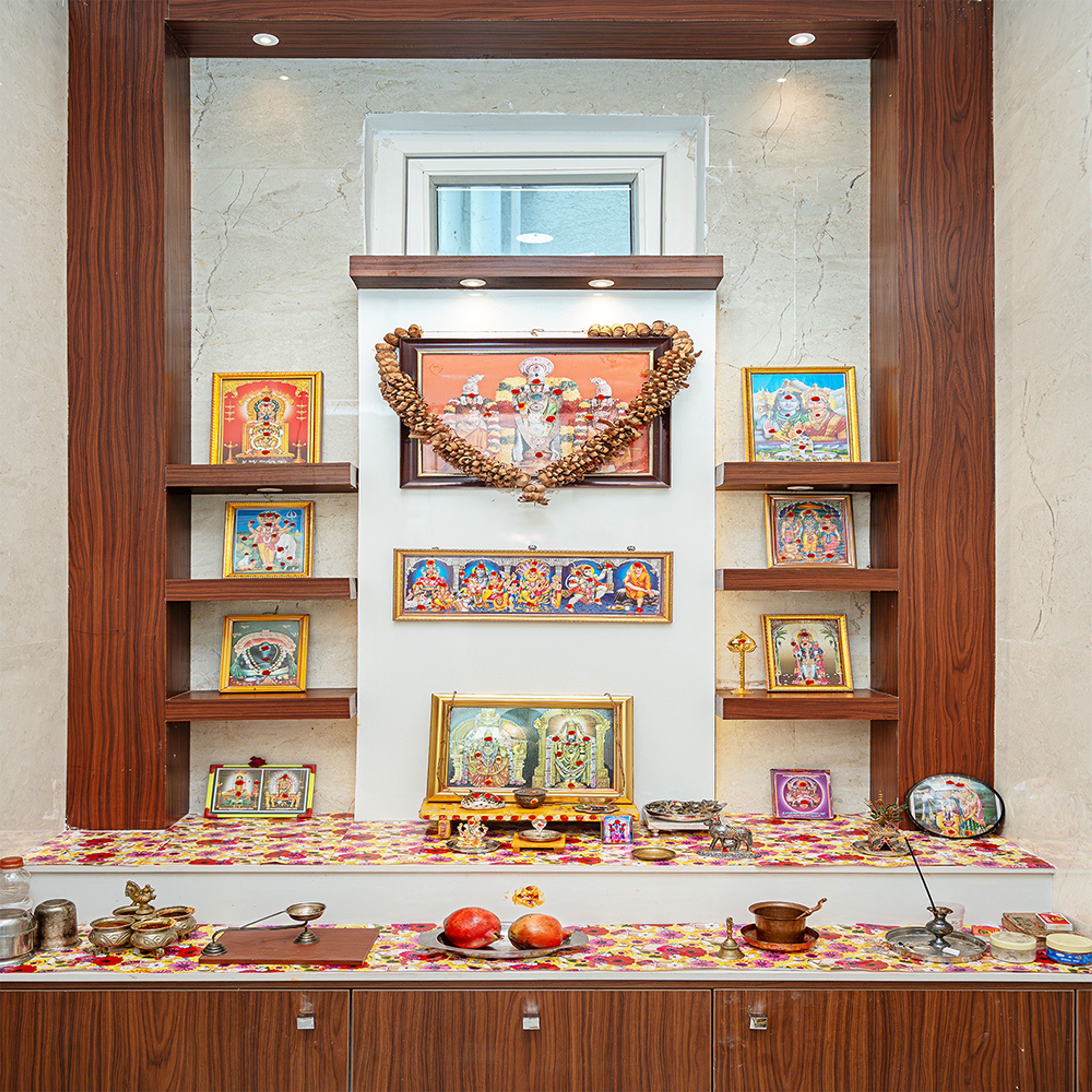 Traditional Wooden Pooja Room Design with Om Artwork and Low Cabinets