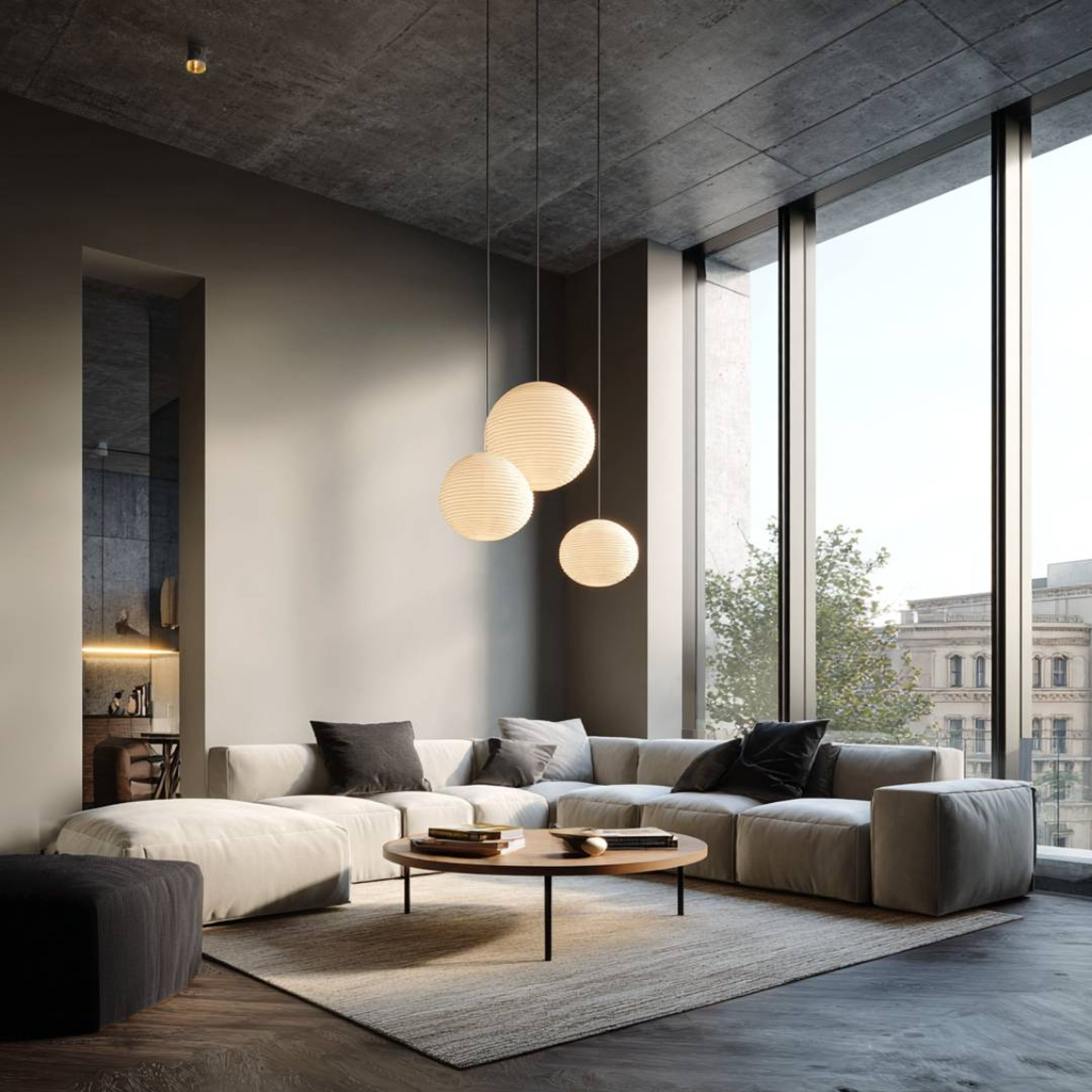 Living Room Design With Round Wooden Table and White L-Shaped Sofa