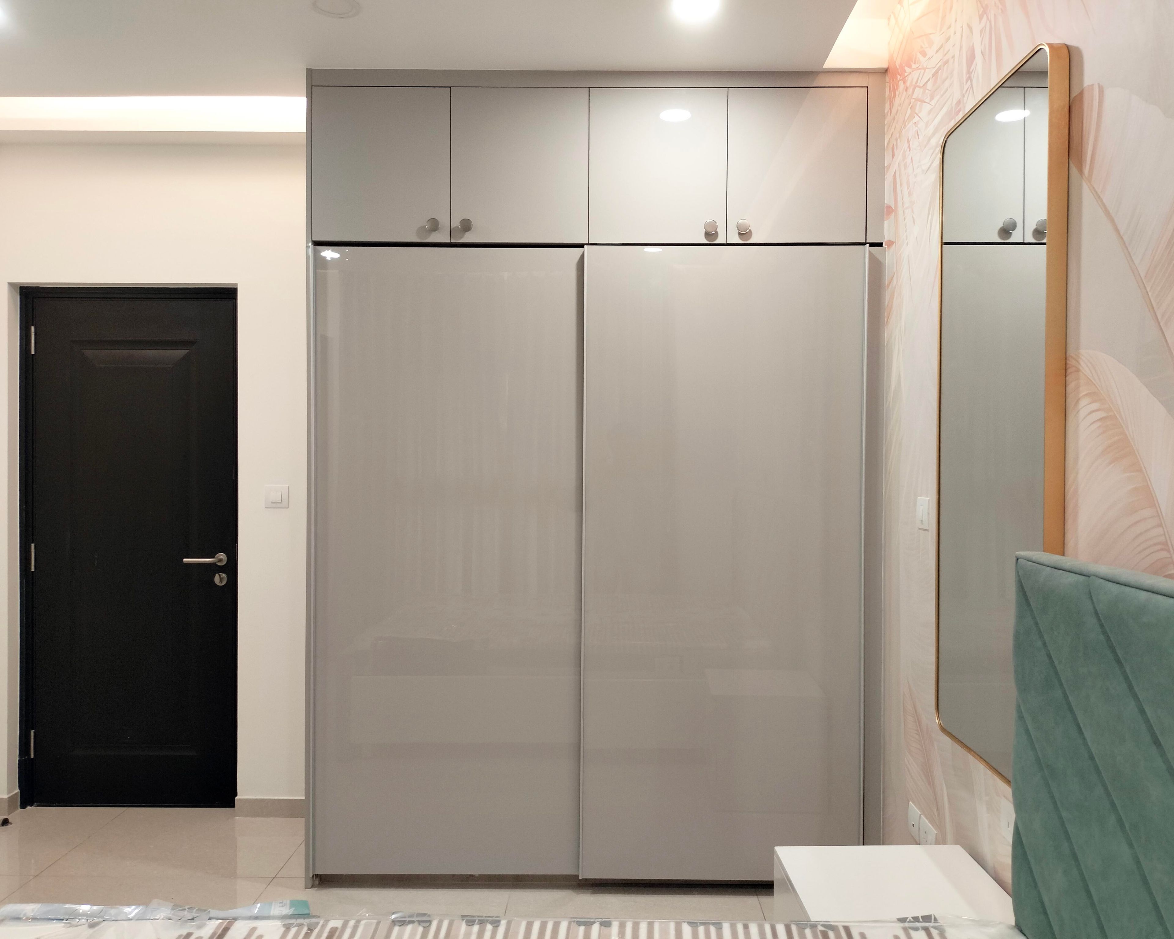 Contemporary Grey Sliding Wardrobe Design with Suede Finish Laminate