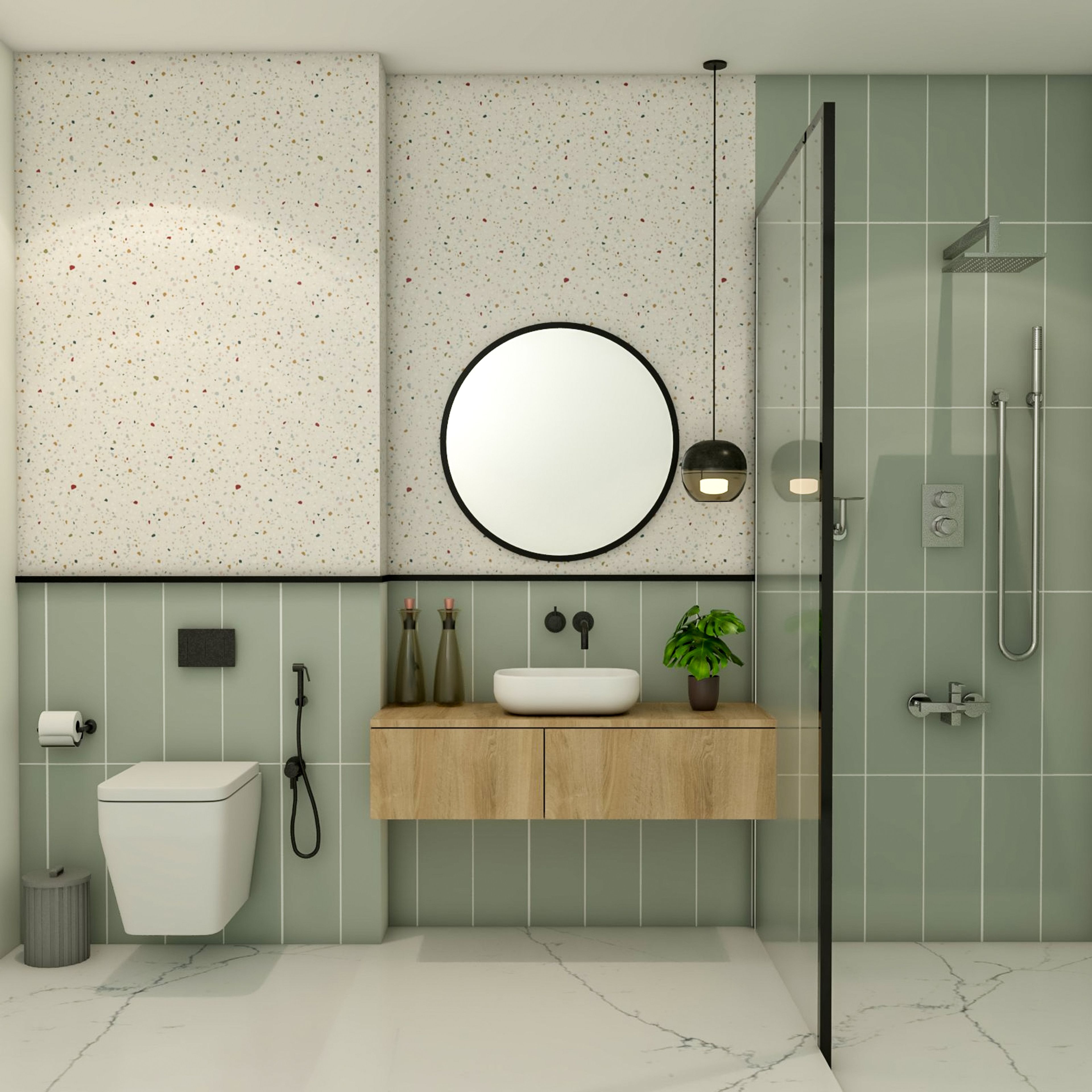 Compact Bathroom Design With Green And White Tiles WIth Multicoloured Spots, Round Mirror And Wooden Vanity Unit - Livspace