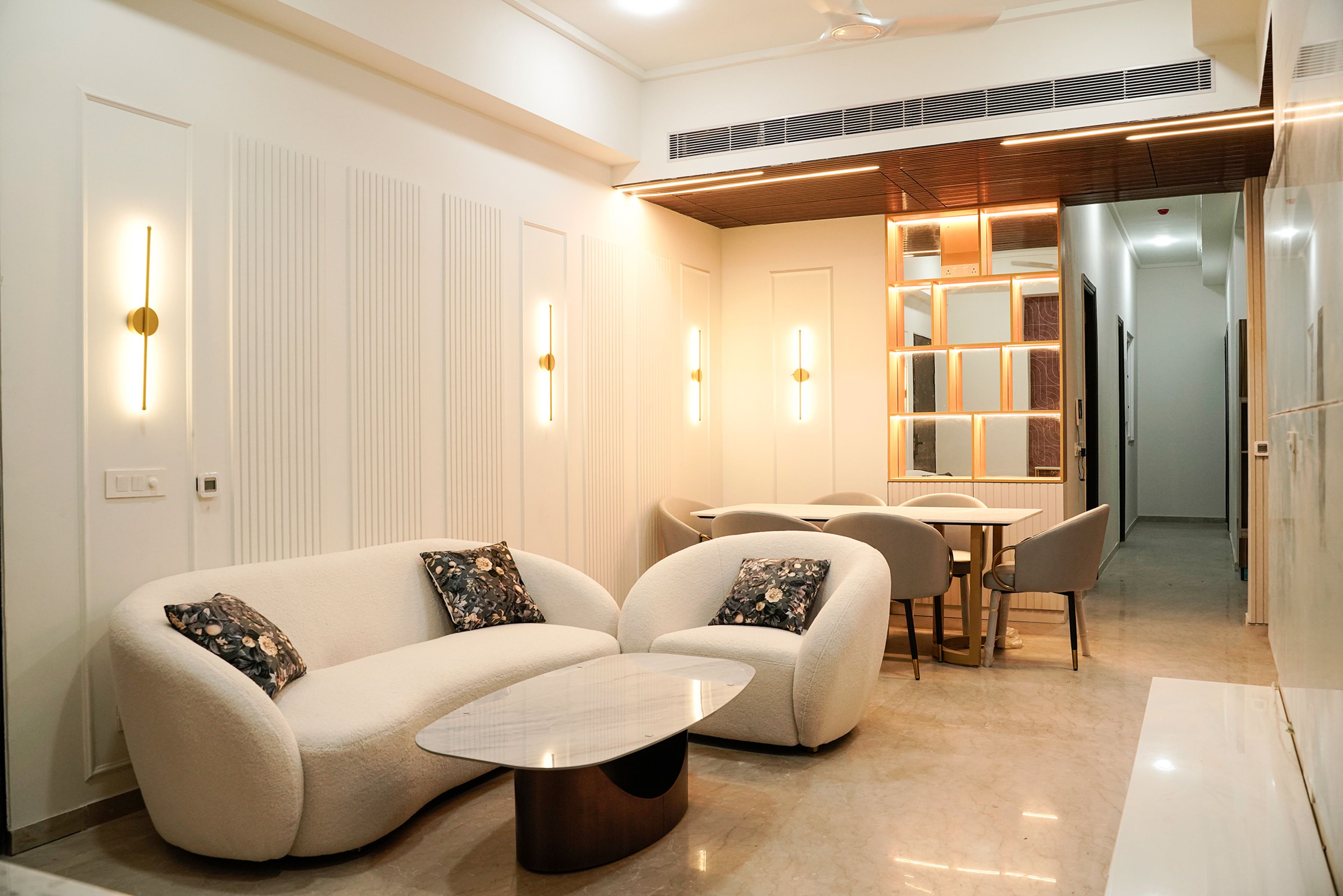 Modern Living Room Design With Curved Sofa and Marble Table