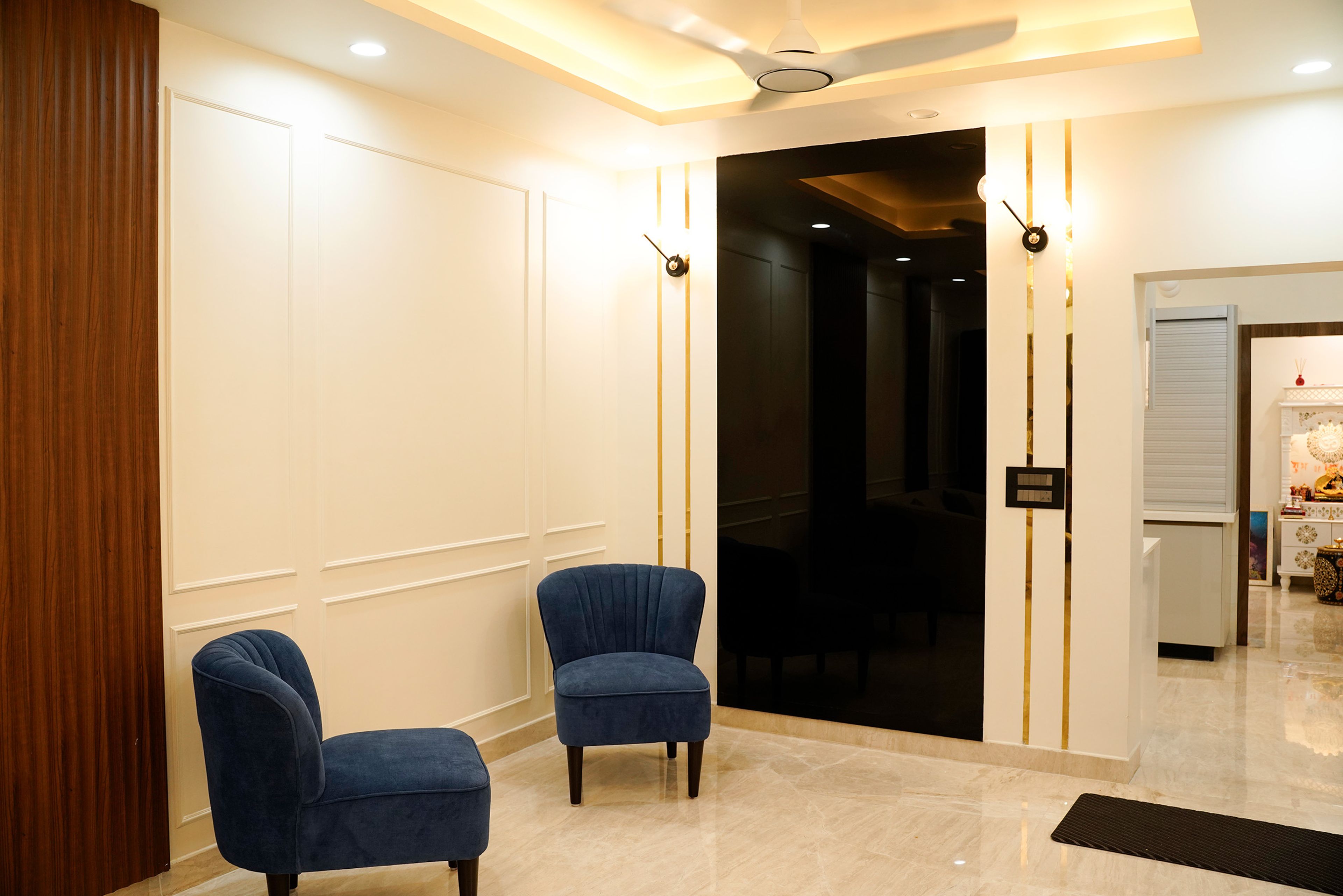 Living Room Design With Beige Sofas and Blue Chairs