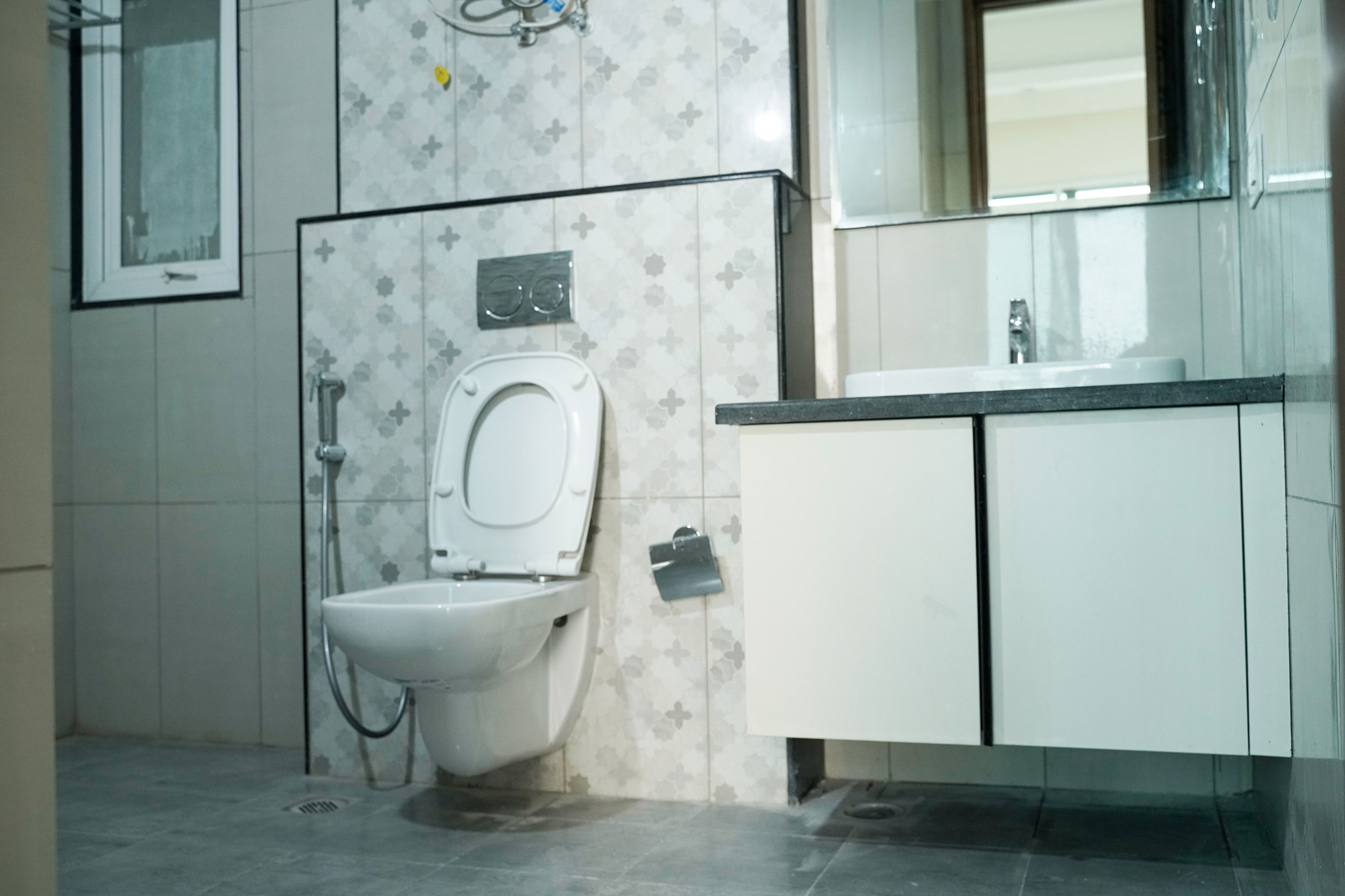 Contemporary Bathroom Design with Beige Grey Tiles and Floating Vanity
