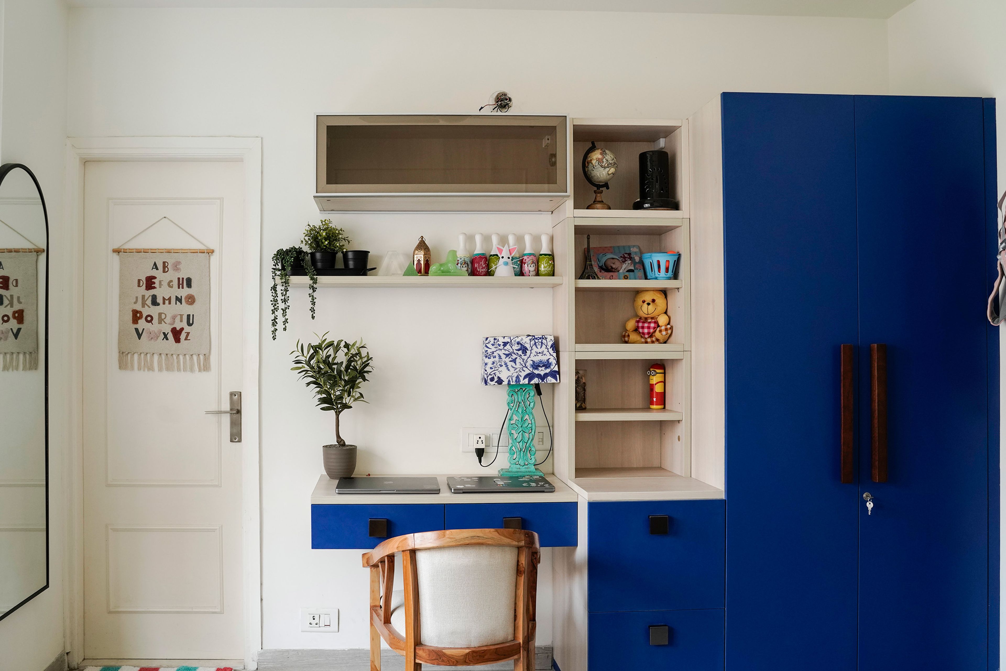 Modern Home Office Design with Multi-Function Desk and Open Shelving