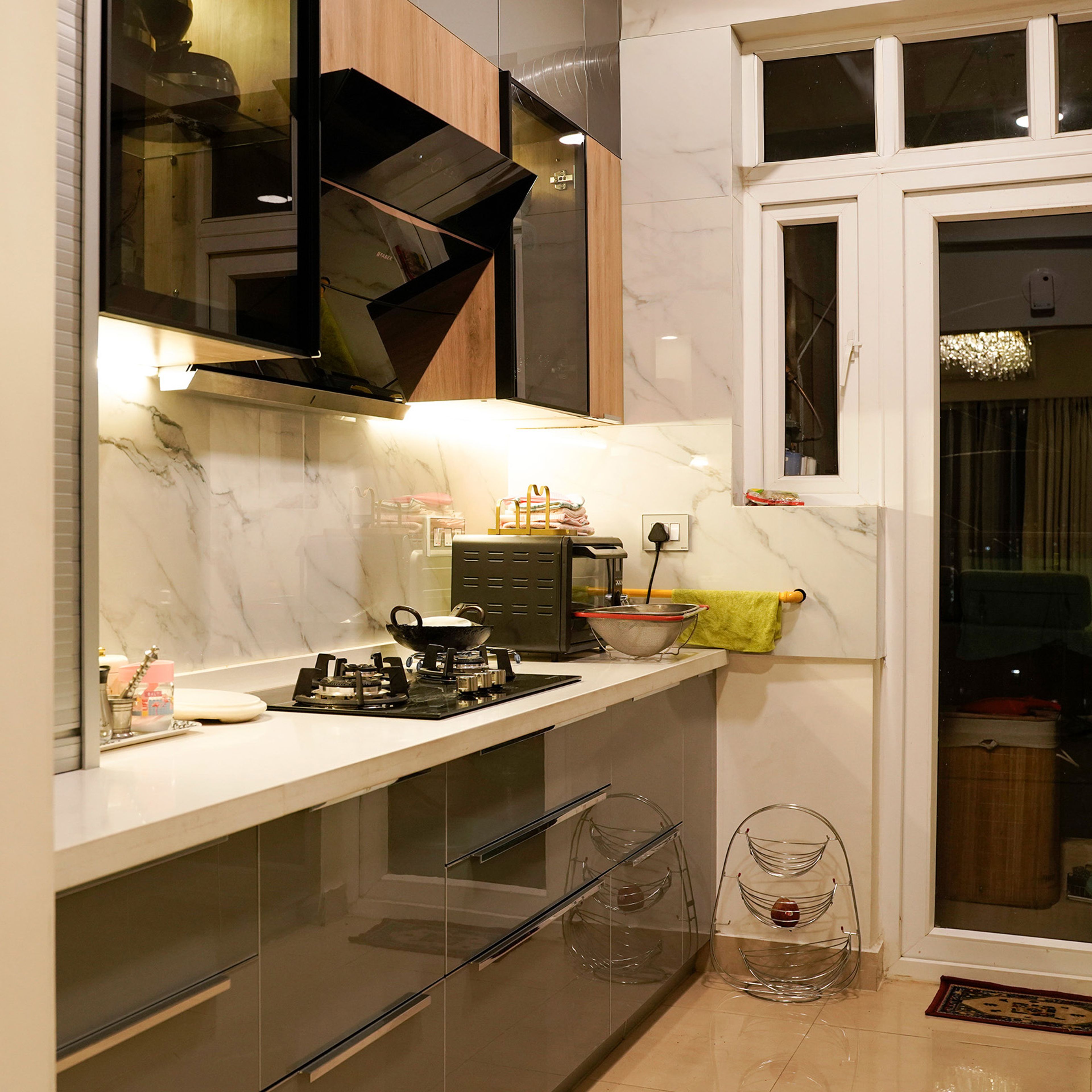 Contemporary Parallel Kitchen Design with Grey Base Cabinets and Wood Wall Units