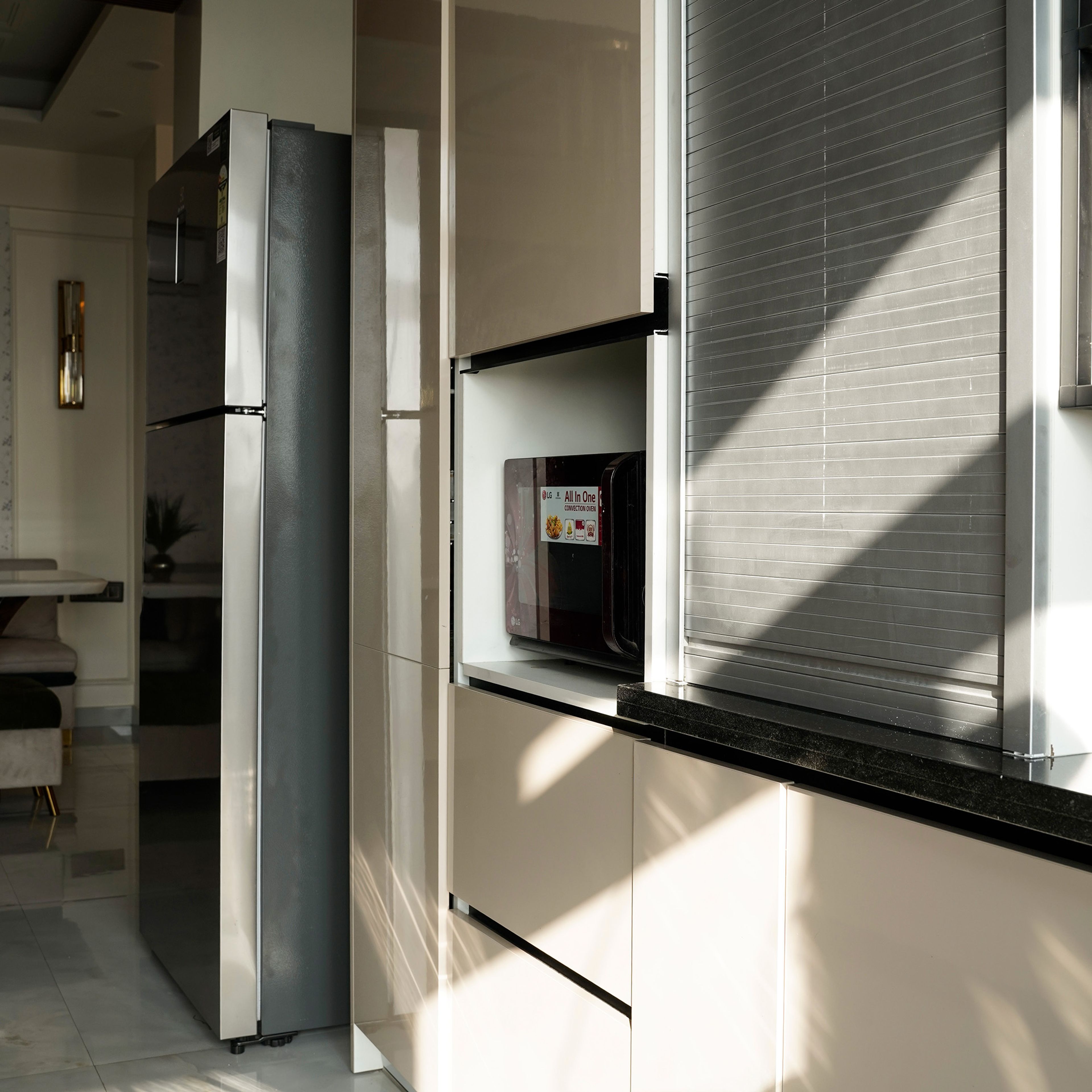 Parallel Kitchen Design with Veined Granite Countertops