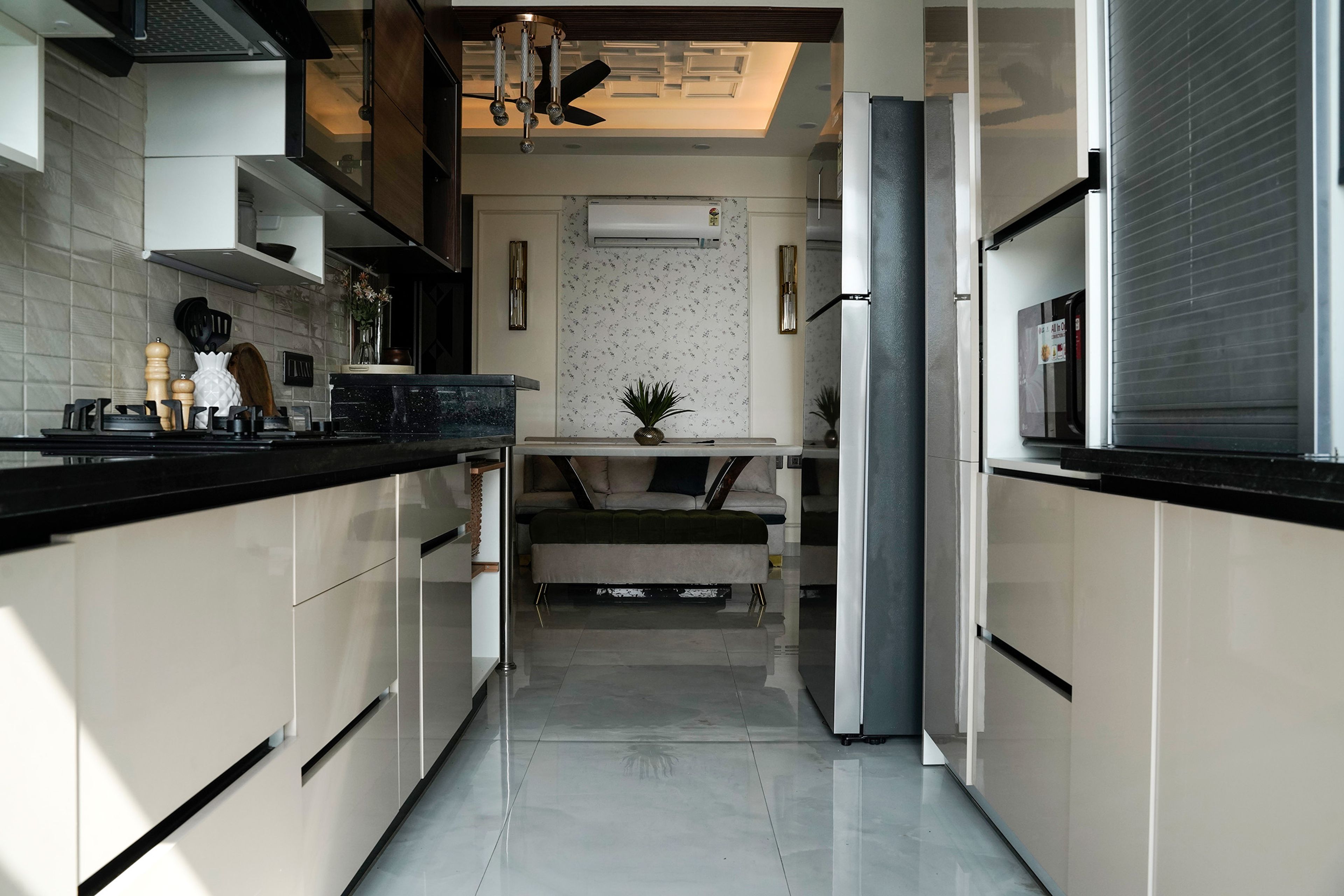 Parallel Kitchen Design with Veined Granite Countertops