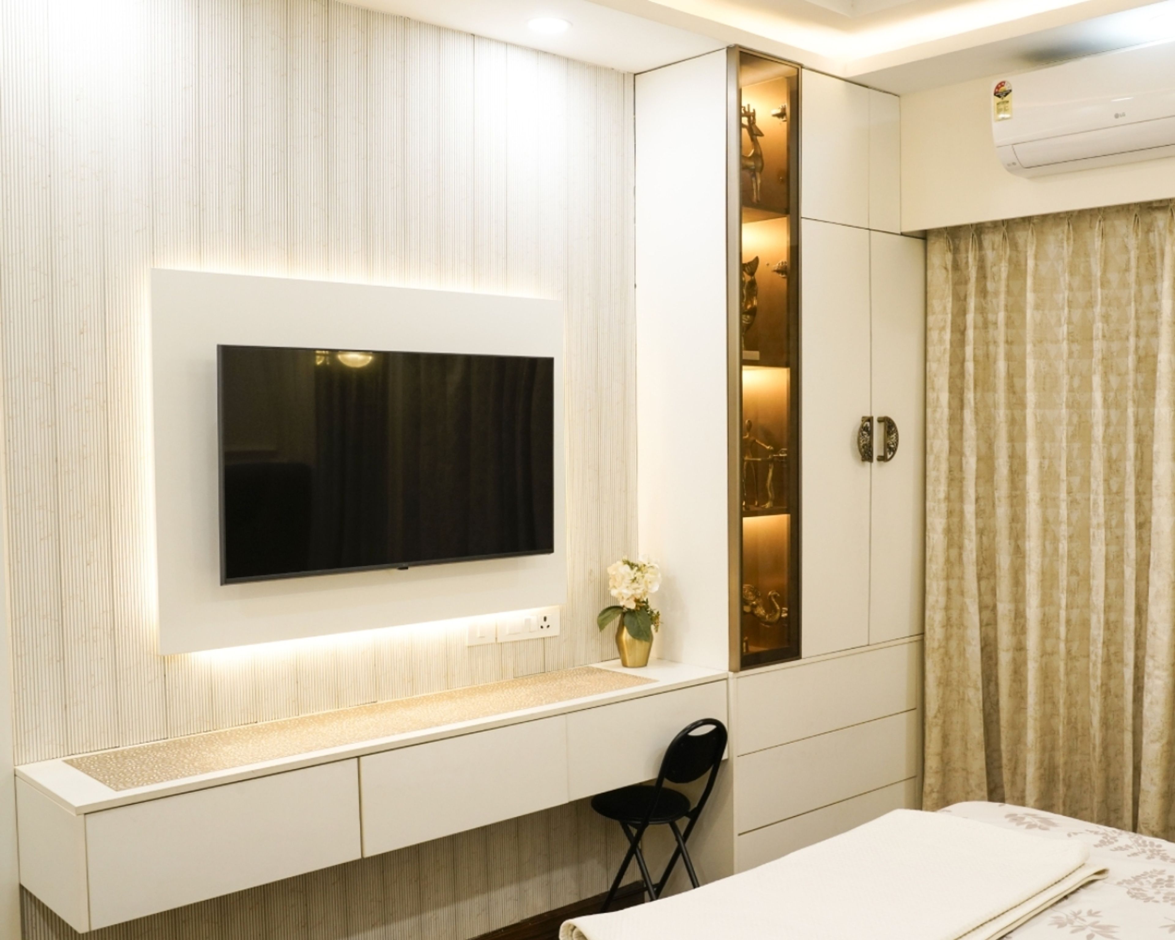 Modern TV Unit Design with White Laminate Finish and Storage