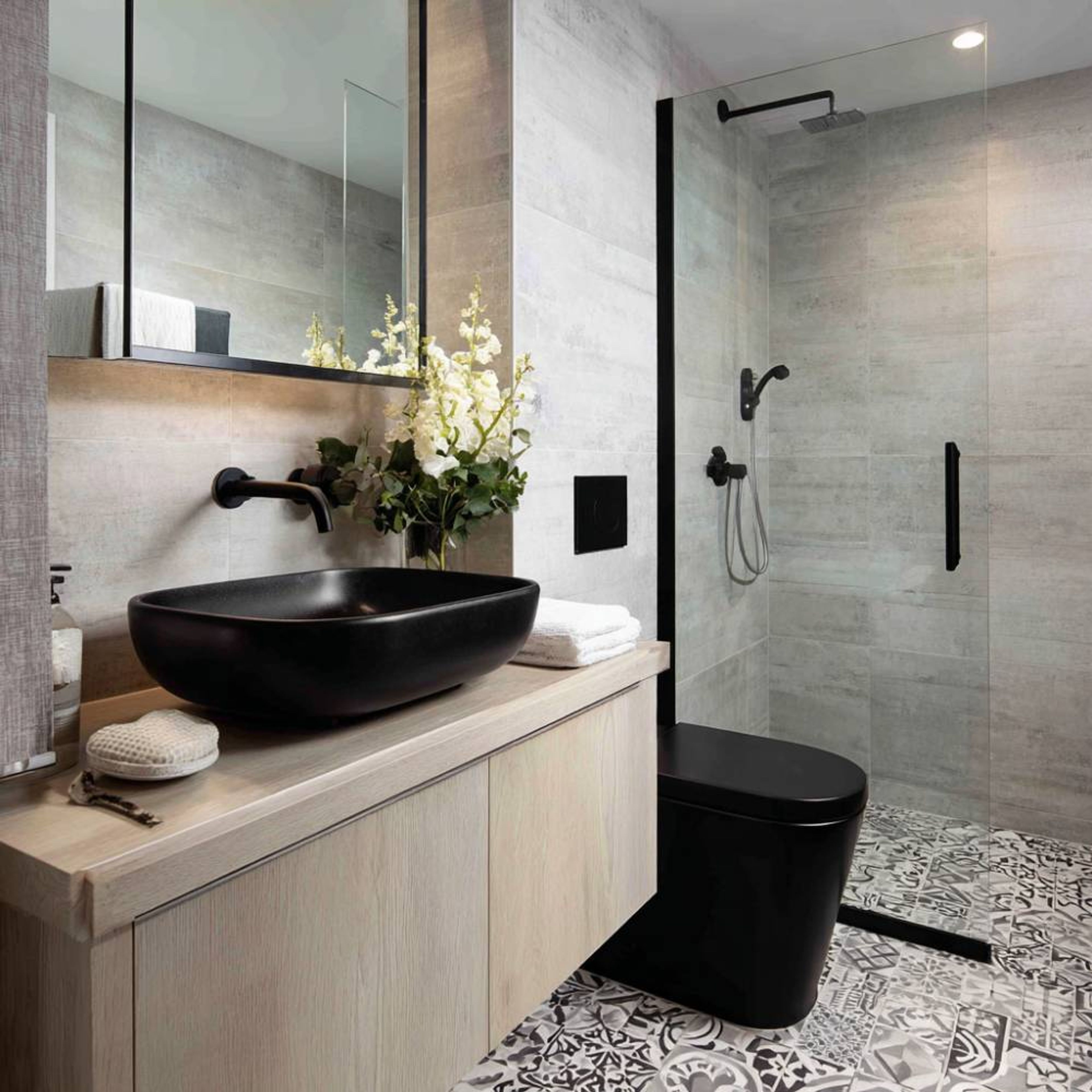 Modern Beige Bathroom Design Featuring Terrazzo Floor and Open Glass Shower