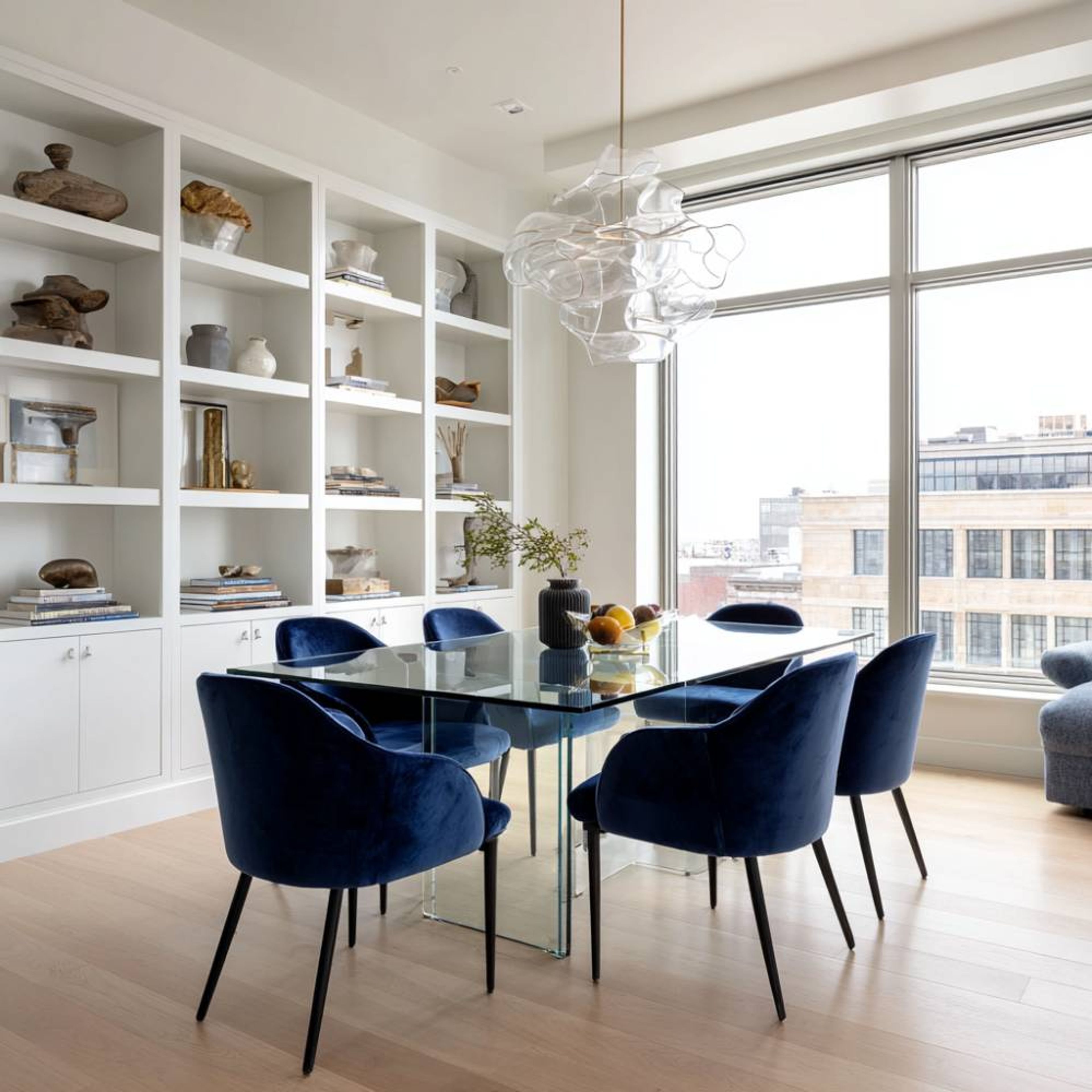 Minimal 6-Seater Dining Room Design with Glass Top Table