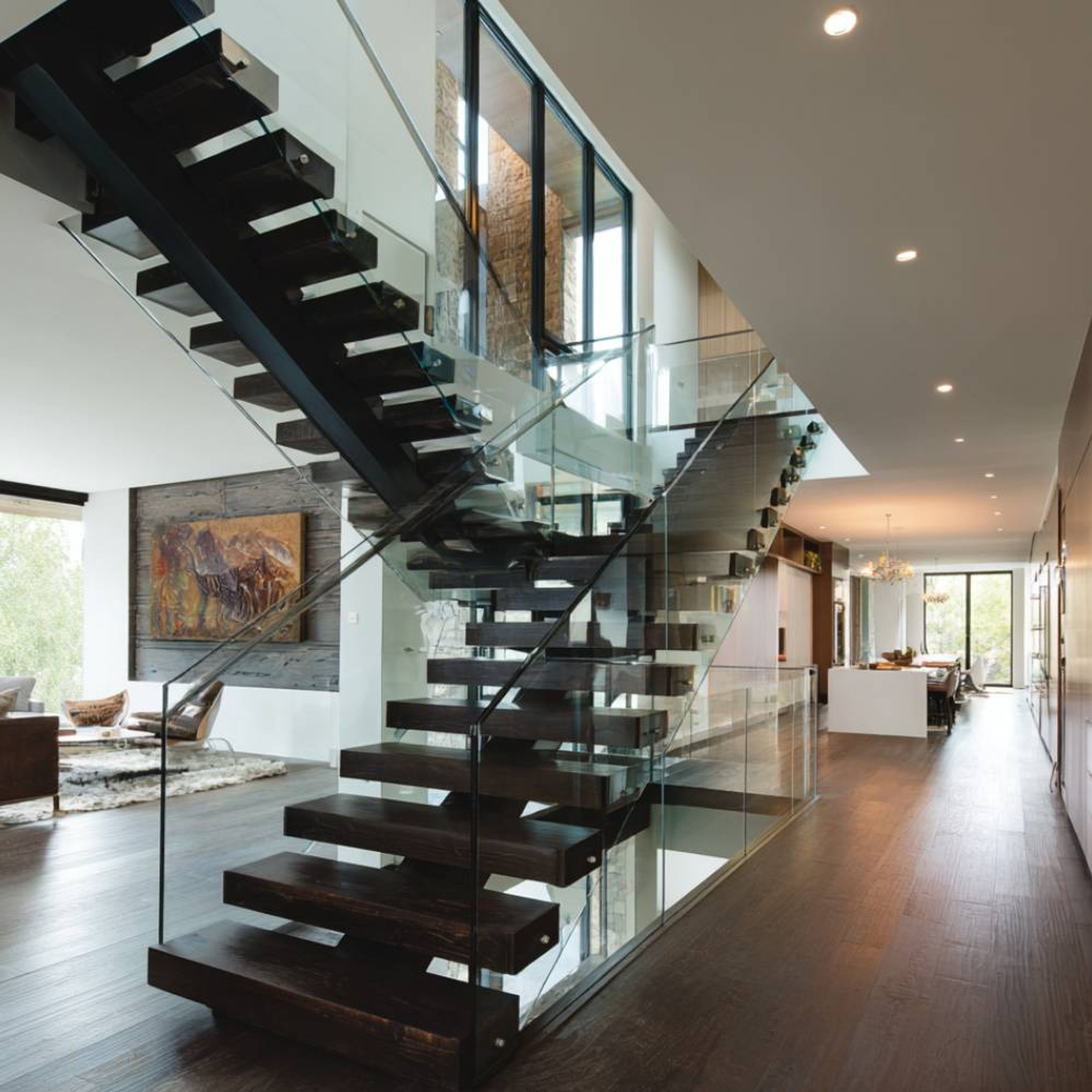 Modern L-Shaped Staircase Design with Wooden Steps and Glass Railing